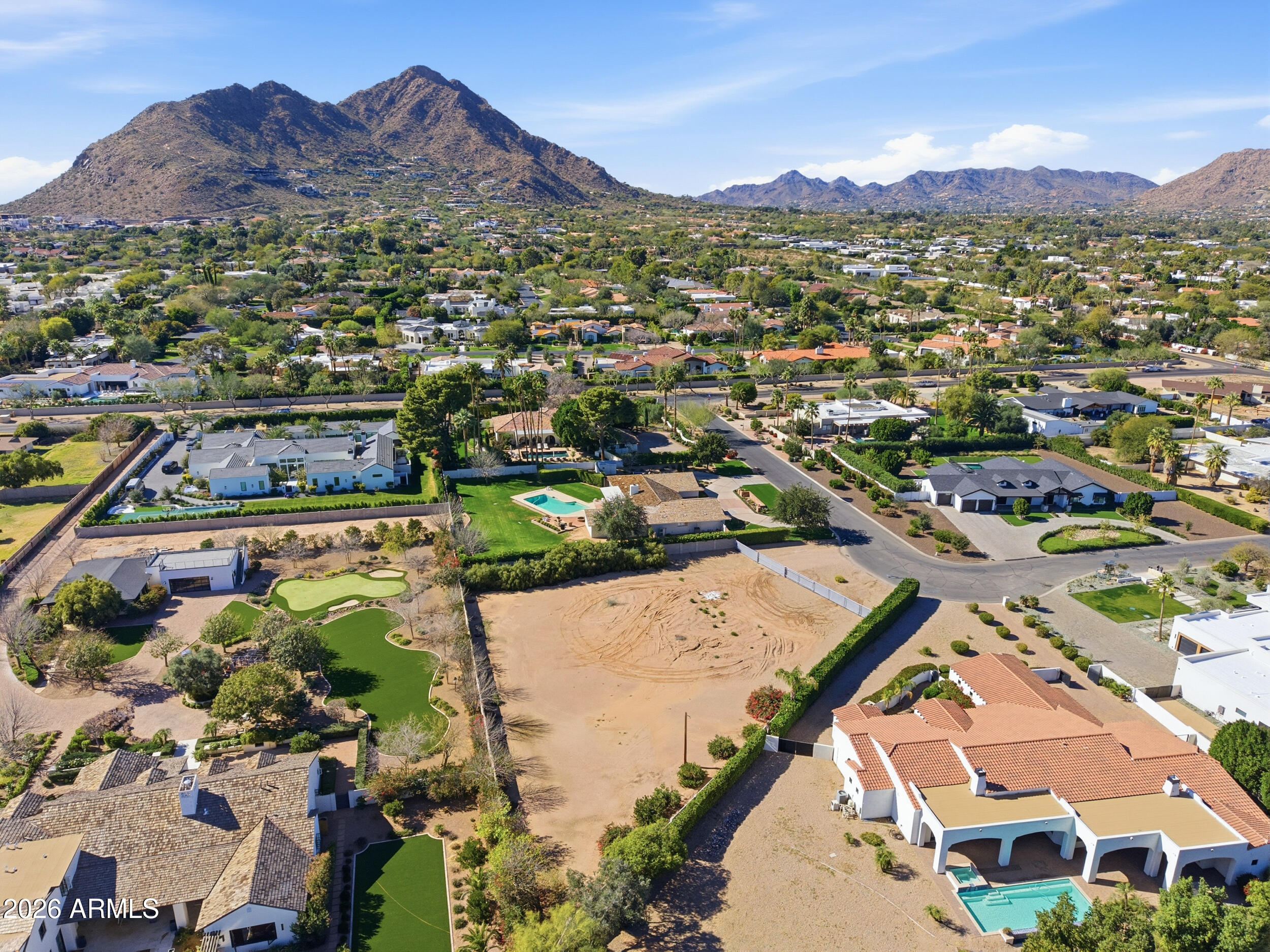Exceptional opportunity at 6827 E Vermont Ave, a premier .7-acre homesite in one of Paradise Valley's most desirable locations. Surrounded by luxury estates and breathtaking mountain views, this is a rare chance to secure a prime parcel in an iconic PV setting.
 
Offered shovel-ready with fully permitted architectural plans designed by Biegner-Murff Architects and commissioned in collaboration with Cameron Custom, the approved estate features approximately 5,700 SF, including 4 bedroom suites, 4.5 baths, a private office, detached guest house, and two separate 2-car garages.

Plans available in connection with construction by Cameron Custom. This is a rare, ready-to-build opportunity in an unbeatable locationsecure it now and start creating your custom Paradise Valley masterpiece!
