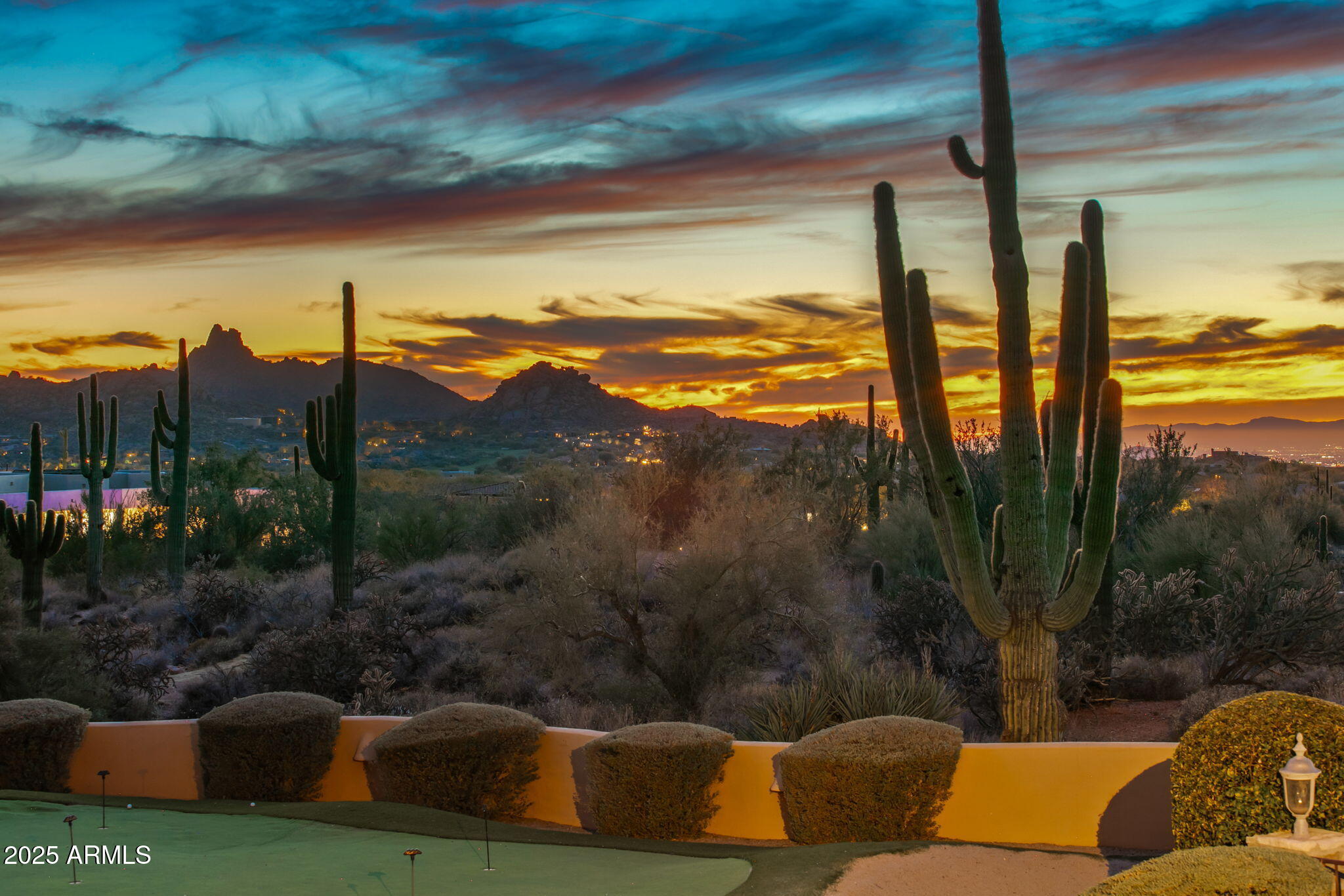 Create a Luxury Masterpiece | North Scottsdale | 5 Acres w/ Endless Lifestyle Options. Rare 5-acre property with panoramic 360° views of Pinnacle Peak, extensive city lights & surrounding mountains. Nestled in one of North Scottsdale's most coveted enclaves, it offers unmatched privacy minutes from Scottsdale National Golf Club & premier lifestyle amenities. Surrounded by multi-million-dollar residences, the property features a charming home to enjoy while designing your vision, 2 elevated building sites, 50+ iconic saguaros & no HOA, allowing private tennis, pickleball, par three & resort-style amenities. Rare opportunity for discerning buyers. Serious inquiries only.