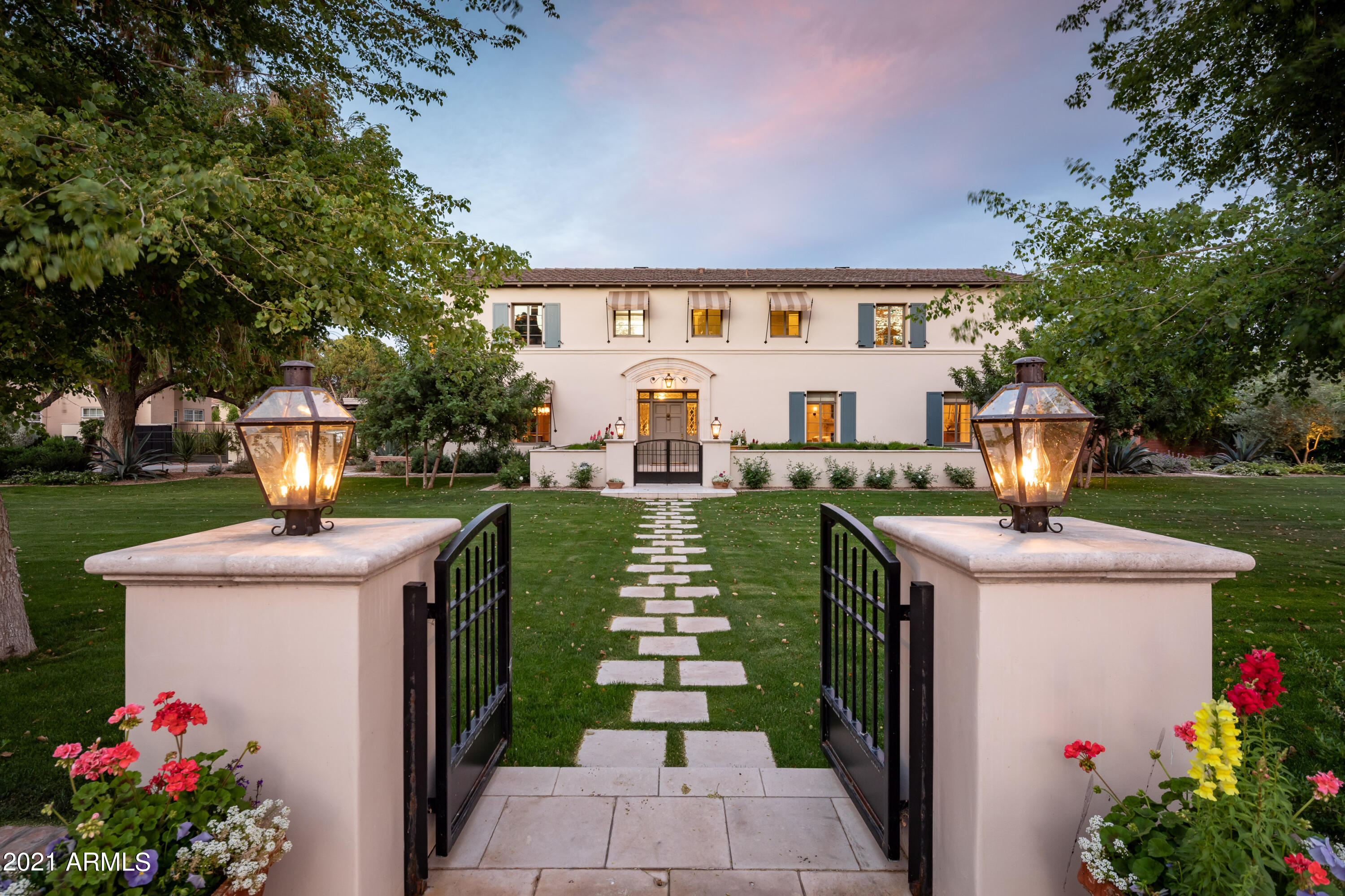 This 1937 timeless Mediterranean home has been impeccably reimagined and professionally remodeled from top to bottom with an open floor plan and exquisite features. Designer selected finishes and architect driven remodel/addition seamlessly meld new construction with the original adobe structure. Classic features include formal living and dining rooms, a gourmet kitchen open to the large family room both of which open to the lush, East-facing backyard. The first level also features a den, a separate home office/en-suite bedroom, back kitchen with laundry and food prep staging area, and a detached guest suite. Upstairs are 3 large, ensuite bedrooms including the primary suite. The primary suite features two walk-in closets, custom millwork and marble/limestone master bathroom, with free-standing soaking tub and oversized Walker Zanger tile in the shower.

The large backyard offers exceptional entertaining and indoor/outdoor living with a fantastic pool, sport court, numerous patios and fantastic mature landscaping. Tall ficus trees surround the backyard and creates a green oasis.

The exterior landscaping detail includes limestone, pavers, French terra cotta, 2 water features, herb/vegetable garden, fruit trees, firepit and several serene sitting areas to enjoy the expansive front, back and side yards.

The generously sized 2 car garage was also fully remodeled and a custom steel pergola shade structure was added for 2 more covered parking spaces.

Rare opportunity for the perfect blend of historic charm and modern luxury!