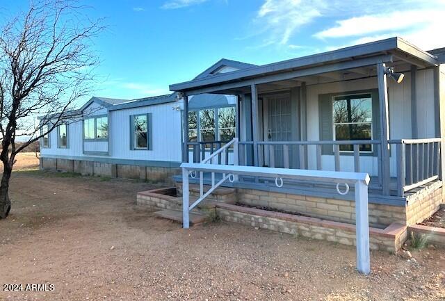 Check out this AMAZING 4 bedroom/2 bath 2,128 sq ft home on 4 acres with a NEW roof, NEW paint and like-NEW flooring! The master suite boasts a large bedroom, walk-in closet AND an additional room that could be used as an office, sitting room, game room, or ??? The master bathroom has a separate shower and garden tub, double sinks and lots of storage. Enjoy the cool comfort of this beautiful home as you whip up a special meal in the efficient, roomy kitchen or step out onto the back deck to entertain and enjoy the majestic mountain views. This home has storage room for all those extra items and there is plenty of acreage for whatever your outdoor needs might be! Call for a private tour today and see if this is the HOME for YOU!
