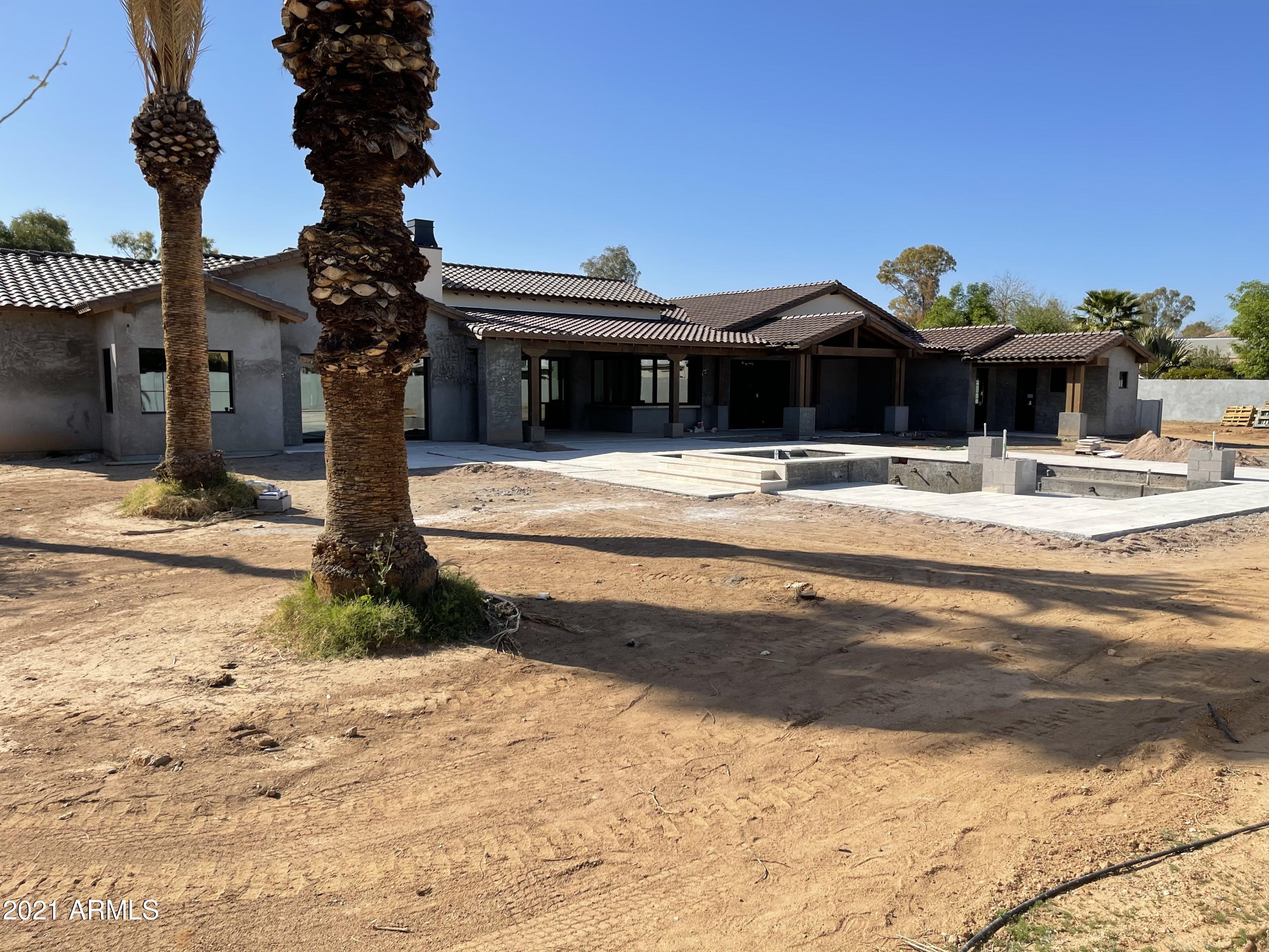 Brand New 2021 Build built by ZM Development. Home Features just over 6500 sq ft with 6bd/6.5bth, office,  family room and a 4 car garage set on a .85 Acre lot. Complete front and backyard landscape with pool/spa. A must see.  Home is 90% Complete .  Working on landscaping & Pavers