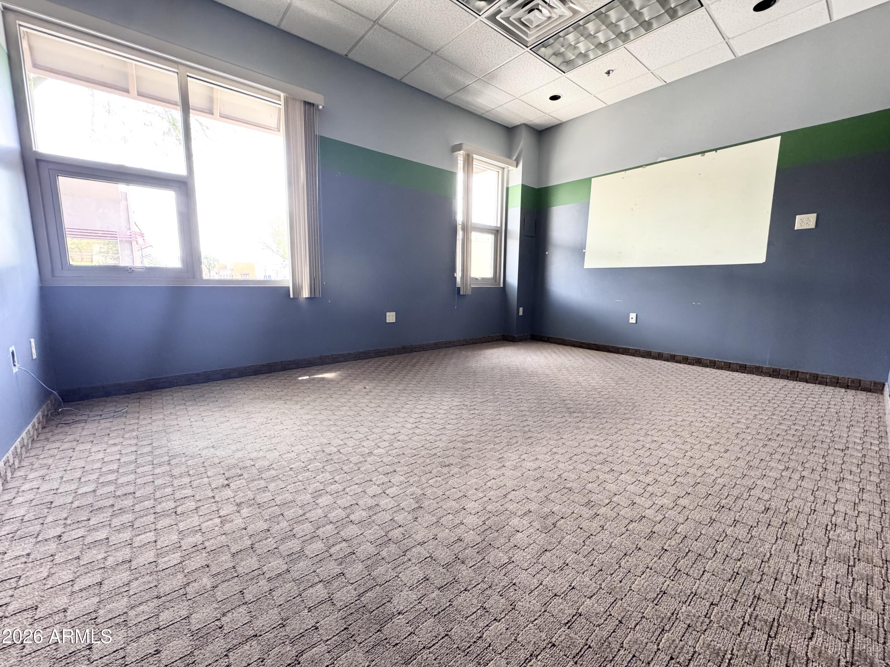 BELL PROFESSIONAL CENTER CONDOMINIUM 1ST AMD - Commercial Lease