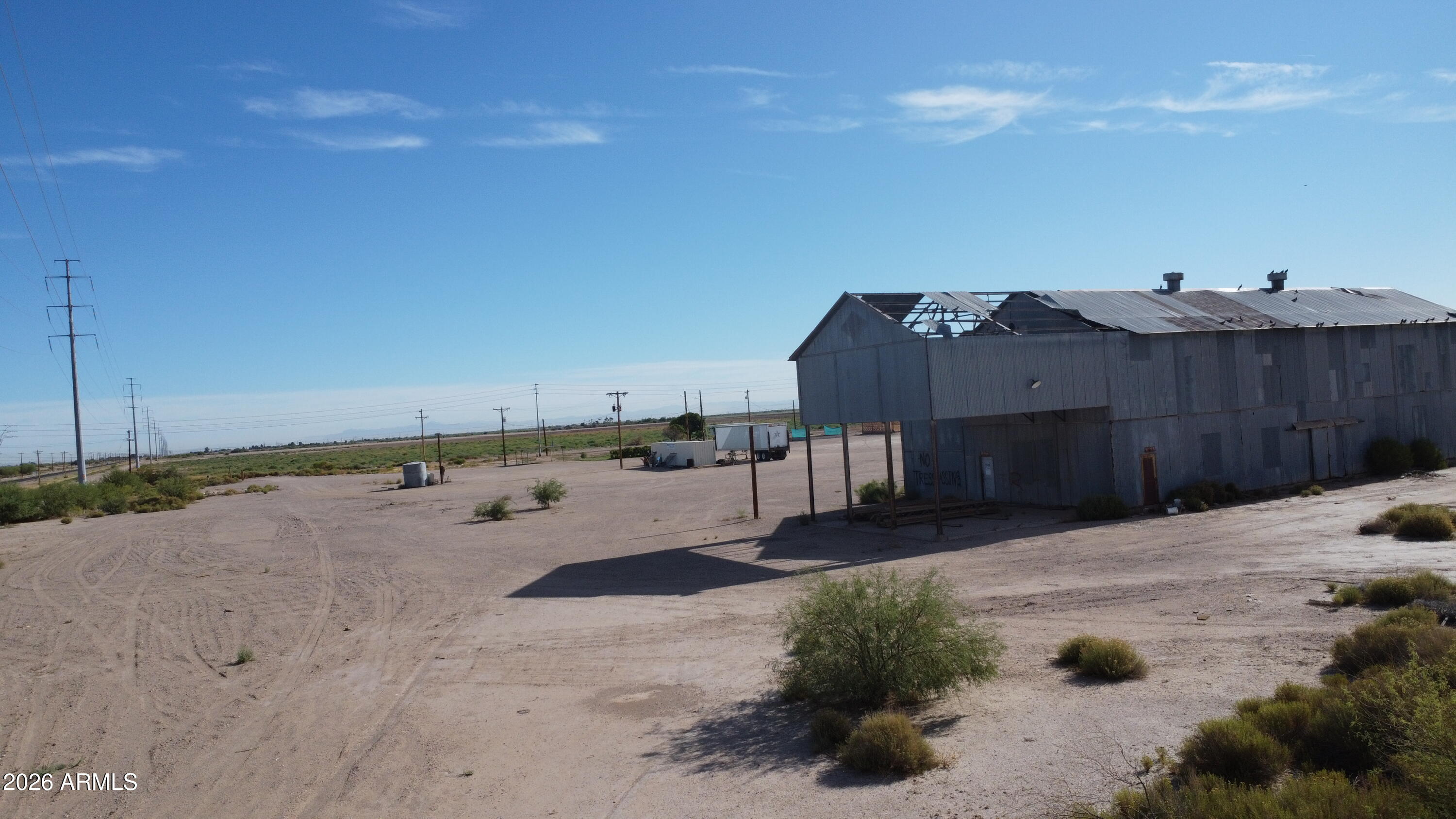 Rare 20Â± acre investment opportunity in Pinal County, ideally located near I-10 with electricity and water already on site. The parcel includes two wells -- a domestic well and an 800' observation well -- sitting atop a productive aquifer, making this a standout opportunity for a group or investor looking to establish a private water company. Positioned directly across from an upcoming master-planned development bringing a grocery store, apartments, and a new single-family subdivision to the area, this property offers both immediate utility and strong long-term growth potential. Buyer to verify all well status, water rights, zoning, and usage with Pinal County and ADWR.