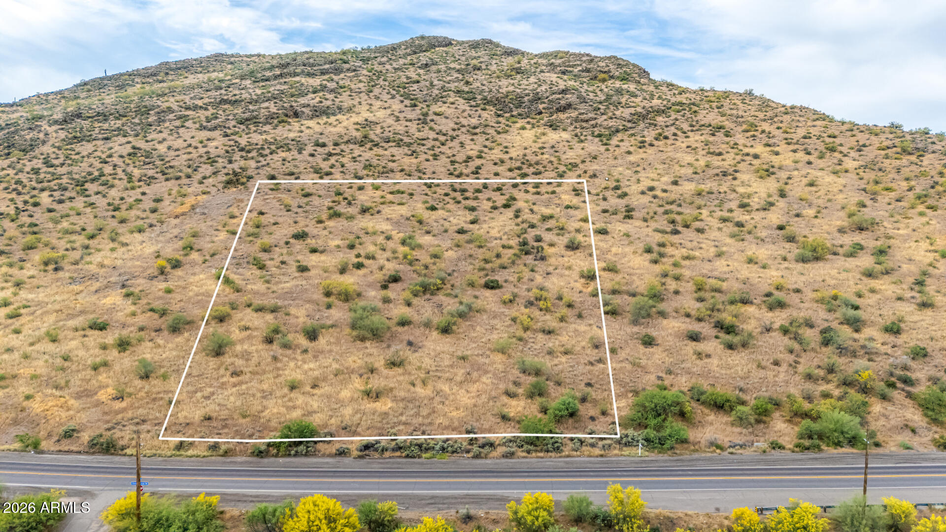 Incredible opportunity to own this 4-acre hillside parcel just off Circle Mountain Road in desirable New River, offering breathtaking, unobstructed views of the Tonto National Forest and surrounding mountains!
This property stands apart with a professionally designed site plan already in place, illustrating a potential 2-lot split with buildable pads and driveway access. Whether you're a builder, investor, or end-user, this parcel offers a rare combination of vision, usability, and upside. Perched on elevated terrain, the lot captures stunning desert sunsets, mountain vistas, and nighttime city light views. Located in a peaceful rural setting while still within convenient reach of Phoenix amenities. The southern property line is directly adjacent to State Trust Land. Come see today!