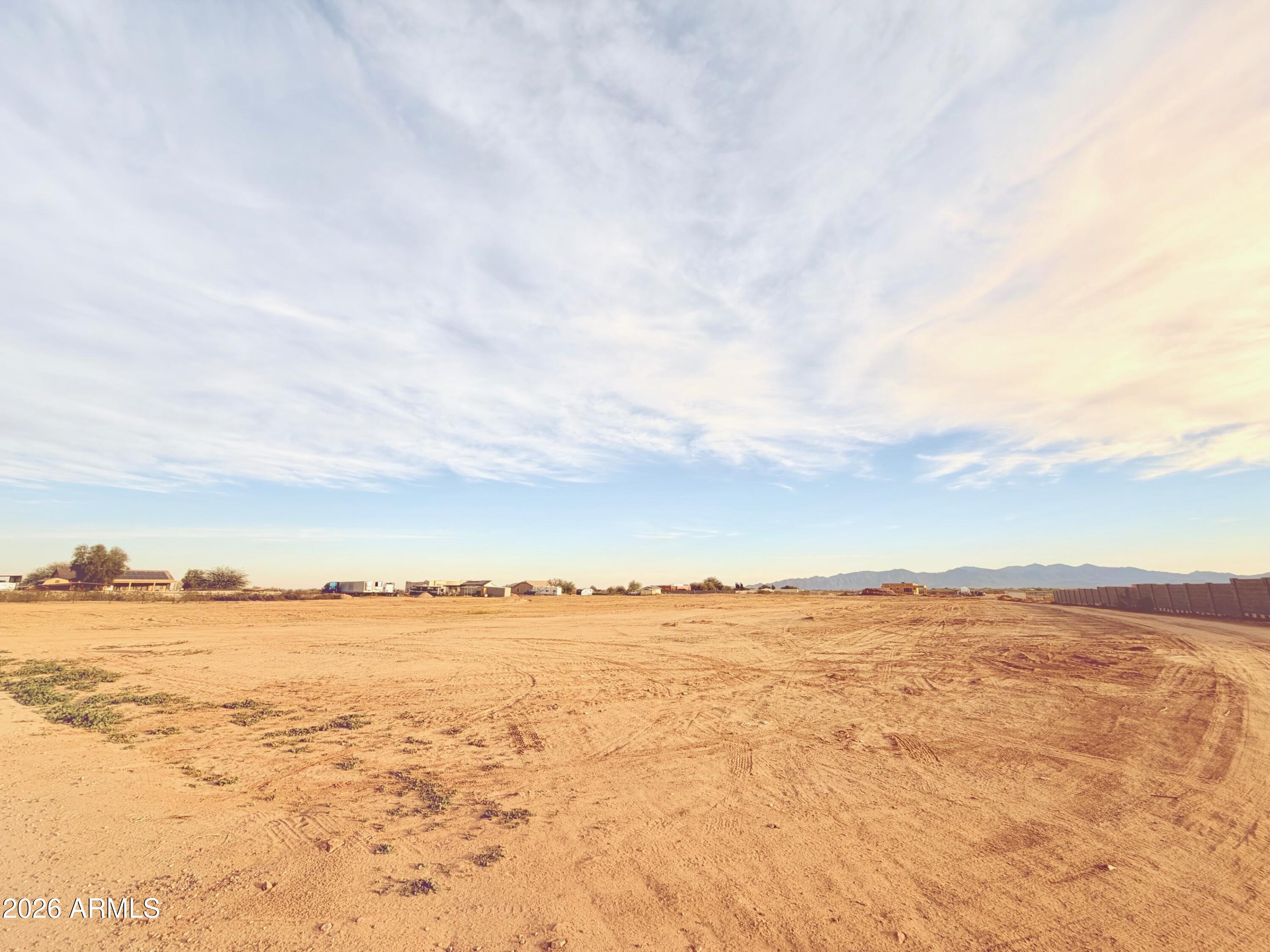 UP TO FIVE, ONE-ACRE LOTS AVAILABLE! Refer to map in photos for lot location. Exceptional lots, cleared and ready to go in the quiet community of Wittmann. NEW SHARED WELL (INSTALLED APRIL 2026). Electric at lots. No flood. No Luke AF APZ. Surrounded by new custom homes/ranches. Room for spacious home PLUS RV garage PLUS guesthouse PLUS horses and all the toys. No HOA. Improved road and shared easement to parcels. EZ access to US60/Grand, the 303, Lake Pleasant, Shopping, Dining, and a quick trip to Vegas. Buyer to verify all info. Septic will be needed. Seller may carry, ask for terms. Multiple lots available. Great opportunity for builder.