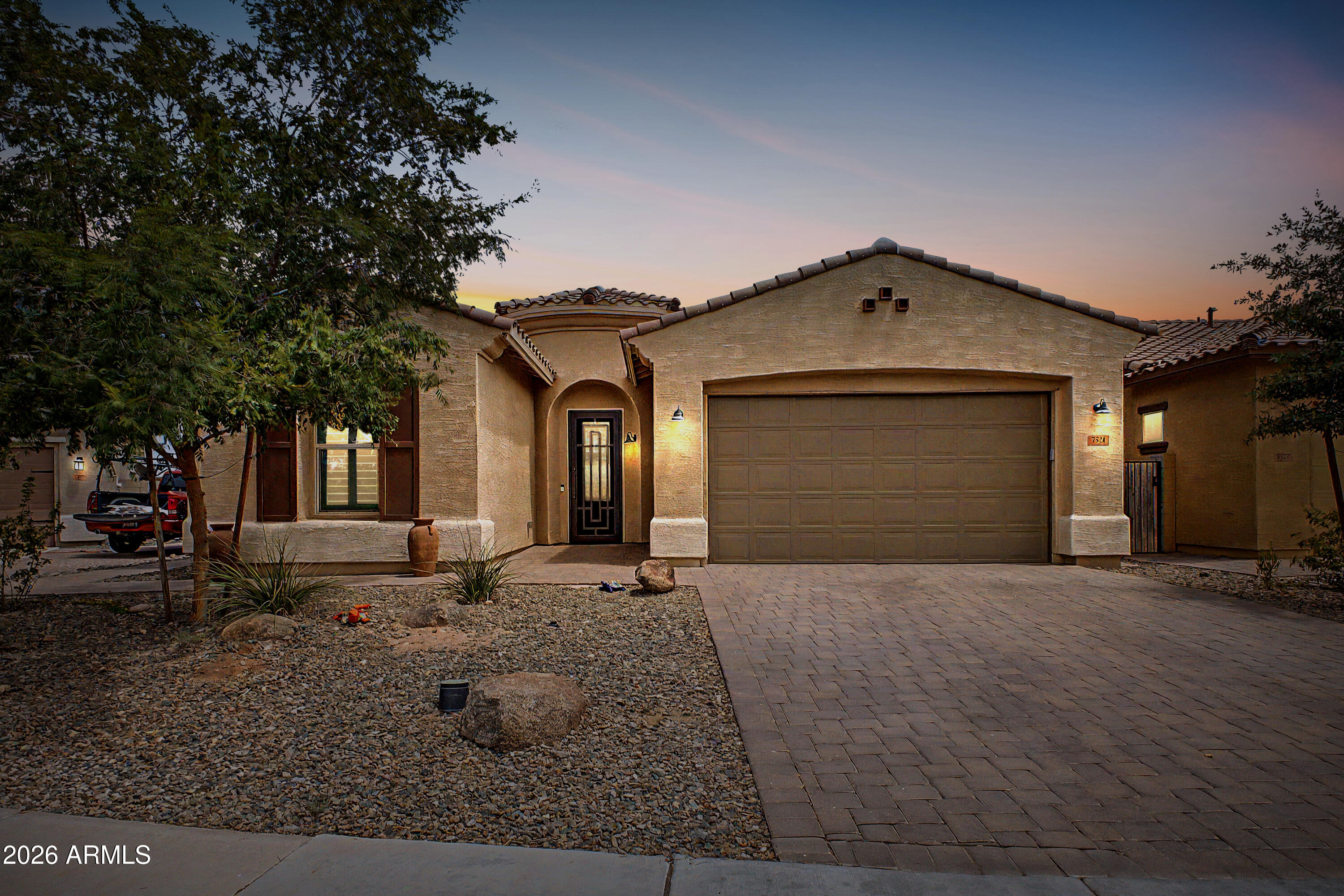 Experience the perfect blend of luxury, comfort, and breathtaking desert scenery in this beautifully upgraded 4-bedroom, 2.5-bath home offering 2,231 square feet of thoughtfully designed living space. The stunning gourmet kitchen is the heart of the home, featuring an oversized granite island, subway tile backsplash, stainless steel appliances, a gas cooktop, abundant cabinetry, and an open layout perfect for everyday living and entertaining. The generous family room is filled with tons of natural light and features dual sliding doors, creating the perfect indoor-outdoor living experience.
The expansive primary suite is a true retreat, offering a spa-inspired ensuite with dual vanities, an oversized super shower, and a spacious walk-in closet. Three additional generously sized bedrooms provide plenty of flexibility for family, guests, or a home office. Step outside to your own private backyard situated on a premium oversized lot with no neighbors behind. Soak in the breathtaking mountain views while relaxing under the extended pergola complete with a misting system, entertaining on the expanded paver patio, or unwinding in the jacuzzi after a day of adventure. Located in the heart of Gold Canyon at the base of the iconic Superstition Mountains, this home offers an unbeatable Arizona lifestyle with world-class hiking, horseback riding, mountain biking, championship golf courses, and endless opportunities to explore the beauty of the Sonoran Desert.