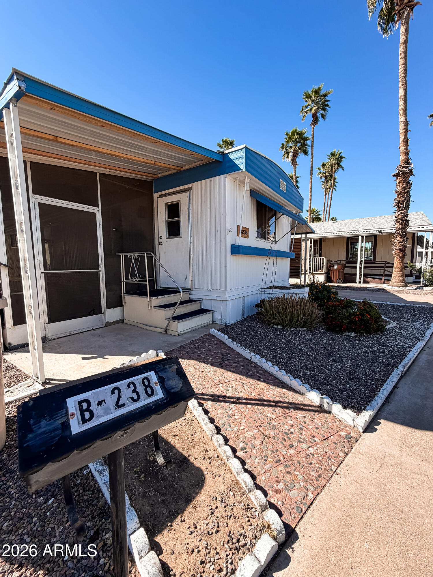 Welcome to this inviting 2-bedroom, 1-bath home located in a well-maintained 55+ community. This home features new laminate flooring throughout and a roof that was re-rolled in 2022, offering both comfort and peace of mind.

Enjoy relaxing or entertaining on the spacious screened-in patio providing the perfect space to unwind year round. The carport side includes a generously sized shed with power that houses the washer and dryer and offers additional storage. Make fresh lemonade from your own lemon tree.

Residents enjoy access to community amenities and activities designed for both seasonal visitors and full-time living. An excellent opportunity to enjoy comfortable living at an affordable price point. Just minutes from downtown Glendale, Public Library & restaurants