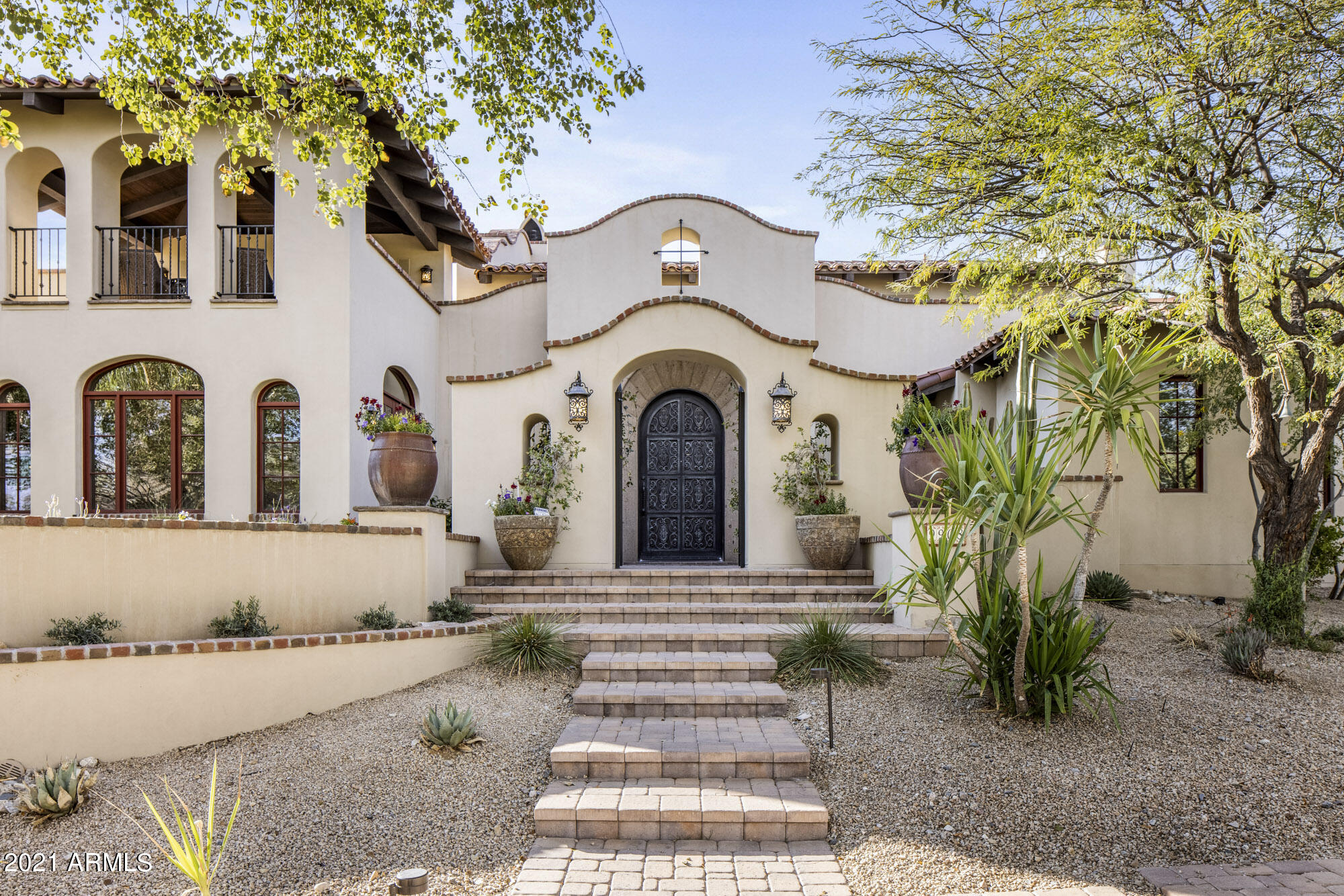 Bring your most discerning Silverleaf buyer to this exquisite Santa Barbara estate where You'll be greeted by a light and bright open floor plan leading to disappearing doors that bring true indoor/outdoor living to life. Tastefully selected French Oak flooring leads to the professionally designed kitchen w/ custom cabinets, quartz counters, high-end appliances (Subzero/Wolf/Bosch) including 3 ovens, warming oven & 2 dishwashers. Just past the elegant kitchen is a welcoming dining area w/ a walk-in temperature controlled wine cellar. 

The split master retreat is perfectly sized with hand crafted wood beams, a cozy fireplace and private patio. Enjoy the spa-like bathroom with stand alone tub, steam shower, juice bar, his/her water closets, separate vanities and 2 walk in closets. (one wi addt'l washer/dryer). A private gym is conveniently located right off the master!  Take in the Mountain Views from the private outdoor whiskey/cigar bar above the office. This luxurious home has it all! A genuine entertainers dream!