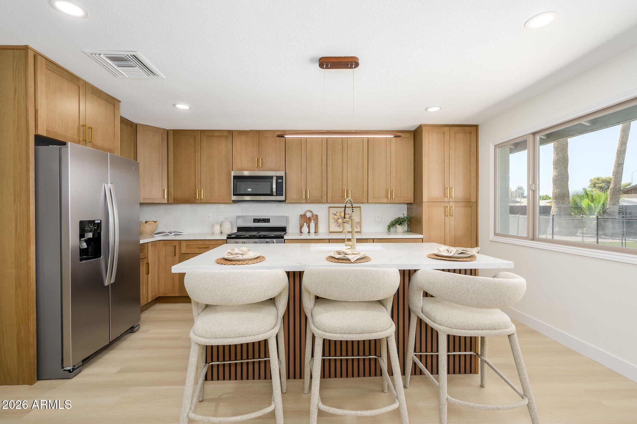 Come and enjoy this amazing remodeled home in South Tempe. The kitchen is a chef's dream, with sleek countertops, stainless steel appliances, and plenty of cabinetry. Step outside to your private backyard paradise--perfect for entertaining. The sparkling pool is surrounded by a generous amount of patio space, making it the ideal setting for outdoor gatherings. Updates include new 2026 pool resurface, 2023 A/C unit, and 2015 roof. Great living area with plenty of space and a cozy fireplace to enjoy your coffee. Amazing location, hard to beat!