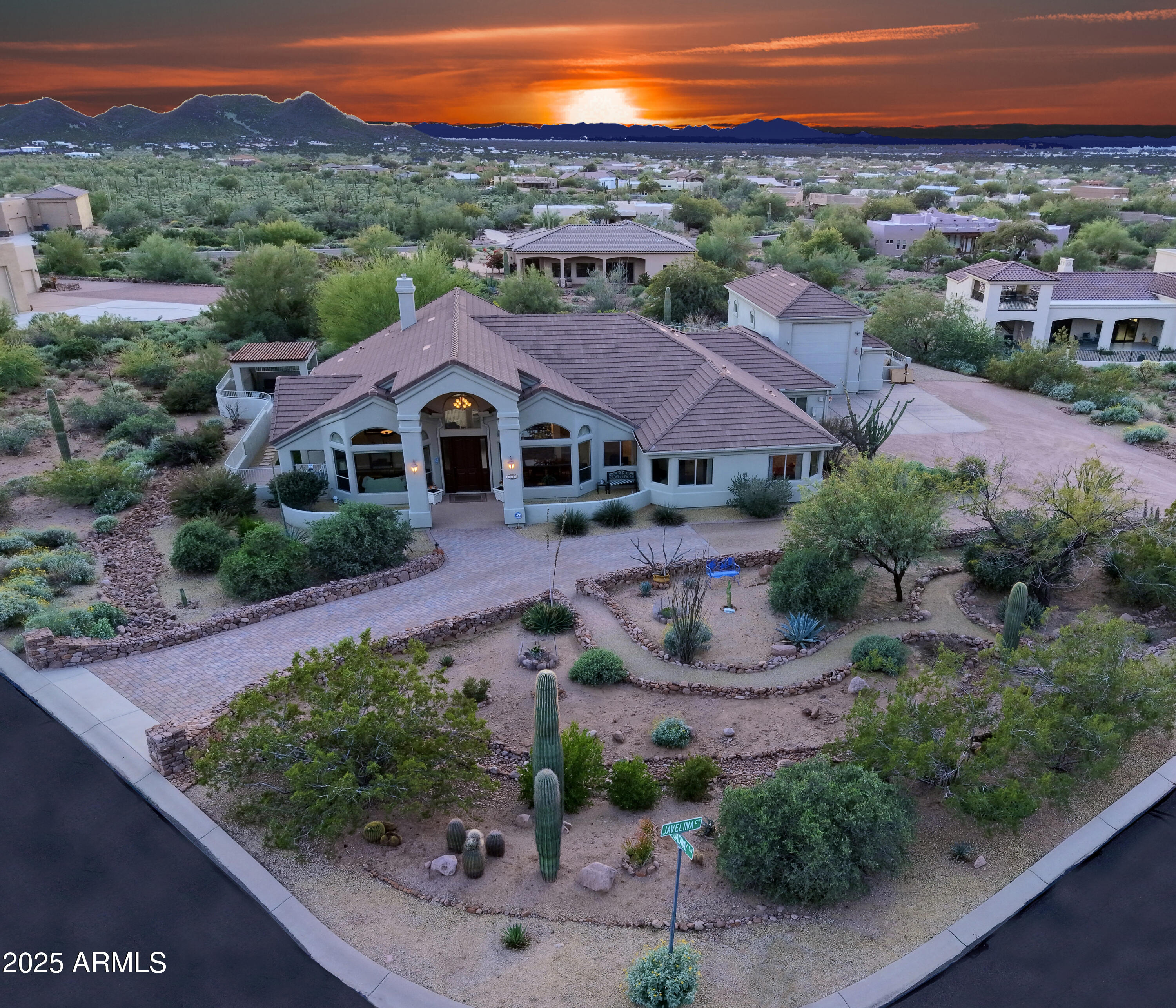 Unmatched Superstition Mountain Views
Wake up each day to breathtaking views of the iconic Superstition Mountains, glowing desert sunsets, and sparkling city lights from this exceptional custom home in the prestigious Superstition Highlands community. Positioned on a private 1.03-acre corner cul-de-sac lot at the base of the mountains, this property was designed to fully embrace Arizona's stunning desert scenery from nearly every angle.
Property Highlights:
• 16x40 RV Garage with hookups & dump
• Oversized 3-Car Garage + Workshop
• Circular Driveway
• Working Gas Fireplace
• Integrated security and whole-home technology features
• Prewired for surround sound, satellite, cable & connectivity infrastructure
• Fenced Backyard with Room for Pool
• 1+ Acre corner entering Cul-de-Sac " Panoramic Mountain & City Light Views
Surrounded by the natural beauty of the Tonto National Forest, this beautifully maintained 2,803 sq ft custom residence offers 4 bedrooms, 2.5 bathrooms, expansive picture windows, and open-concept living spaces thoughtfully designed to frame the dramatic mountain backdrop throughout the home. The patio furniture & LR custom bookcase against the wall conveys.
Blending comfort, functionality, and luxury desert living, the property includes an oversized 3-car garage with a connected 12x12 workshop, plus a rare 16x40 RV garage featuring a 16-foot ceiling, 12x14 door, 50/30 amp hookups, and dump station. Additional features include gated toy/trailer parking, a large laundry room, soft water loop, RO system, dedicated storage room, and abundant built-in storage throughout.
The outdoor living spaces were carefully planned to maximize the surrounding mountain and desert views while offering low-maintenance living and future flexibility. The backyard features turf, a gazebo, grill area, large covered patio, private mountain-view courtyard, and ample room to add a custom pool.
One of the property's most remarkable features is the meticulously curated desert landscaping. Hundreds of indigenous desert plants, mature cacti, and native trees create a refined Sonoran Desert setting that blends seamlessly into the surrounding protected landscape and mountain terrain.
Located in one of Gold Canyon's most sought-after luxury communities, this home offers a rare combination of panoramic mountain views, privacy, acreage, RV accommodations, and convenient access to modern amenities. Enjoy nearby hiking, biking, horseback riding, golf, lakes, shopping, restaurants, medical facilities, and quick access to Phoenix and Mesa airports via the US-60.
Community Highlights:
" Panoramic Superstition Mountain views
" Sparkling city lights and desert sunsets
" Surrounded by Tonto National Forest
" Nearby hiking, biking & horseback trails
" Close proximity to Canyon Lake & Saguaro Lake
" Multiple golf courses nearby
" Quiet custom home community
" Low HOA fees
" Convenient access to shopping, dining & airports
Included with the home: all appliances, washer & dryer, and all window coverings except bedroom curtains.
This is a rare opportunity to own a beautifully maintained desert retreat where extraordinary mountain views, privacy, and space come together in one of Arizona's premier desert communities.
#houseforsale #superstitionmountains #mountainviews #goldcanyon #luxuryhome #rvgarage #desertliving #customhome #goldcanyonrealestate #superstitionhighlands #homeonacrelot #arizonarealestate #apachejunction #citylights #luxurydeserthome
The outdoor living spaces were carefully planned to maximize the surrounding mountain and desert views while offering low-maintenance living and future flexibility. The backyard features turf, a gazebo, a large covered patio with a grill area, a private mountain-view courtyard, and ample room to add a custom pool.
One of the property's most remarkable features is the meticulously curated desert landscaping. Hundreds of indigenous desert plants, mature cacti, and native trees create a refined Sonoran Desert setting that blends seamlessly into the surrounding protected landscape and mountain terrain.
Located in one of Gold Canyon's most sought-after communities, this home offers a rare combination of panoramic mountain views, privacy, acreage, RV accommodations, and convenient access to modern amenities. Enjoy nearby hiking, biking, horseback riding, golf, lakes, shopping, restaurants, medical facilities, and quick access to Phoenix and Mesa airports via the US-60 the
Community highlights include:
" Panoramic Superstition Mountain views
" Sparkling city lights and desert sunsets
" Surrounded by Tonto National Forest
" Nearby hiking, biking & horseback trails
" Close proximity to Canyon Lake & Saguaro Lake
" Multiple golf courses nearby
" Quiet custom home community
" Low HOA fees
" Convenient access to shopping, dining & airports
Included with the home: all appliances, washer & dryer, and all window coverings except bedroom curtains.
This is a rare opportunity to own a beautifully maintained desert retreat where extraordinary mountain views, privacy, and space come together in one of Arizona's premier desert communities.
#houseforsale #superstitionmountains #mountainviews #goldcanyon #luxuryhome #rvgarage #desertliving #customhome #goldcanyonrealestate #superstitionhighlands #homeonacrelot #arizonarealestate #apachejunction #citylights #luxurydeserthome