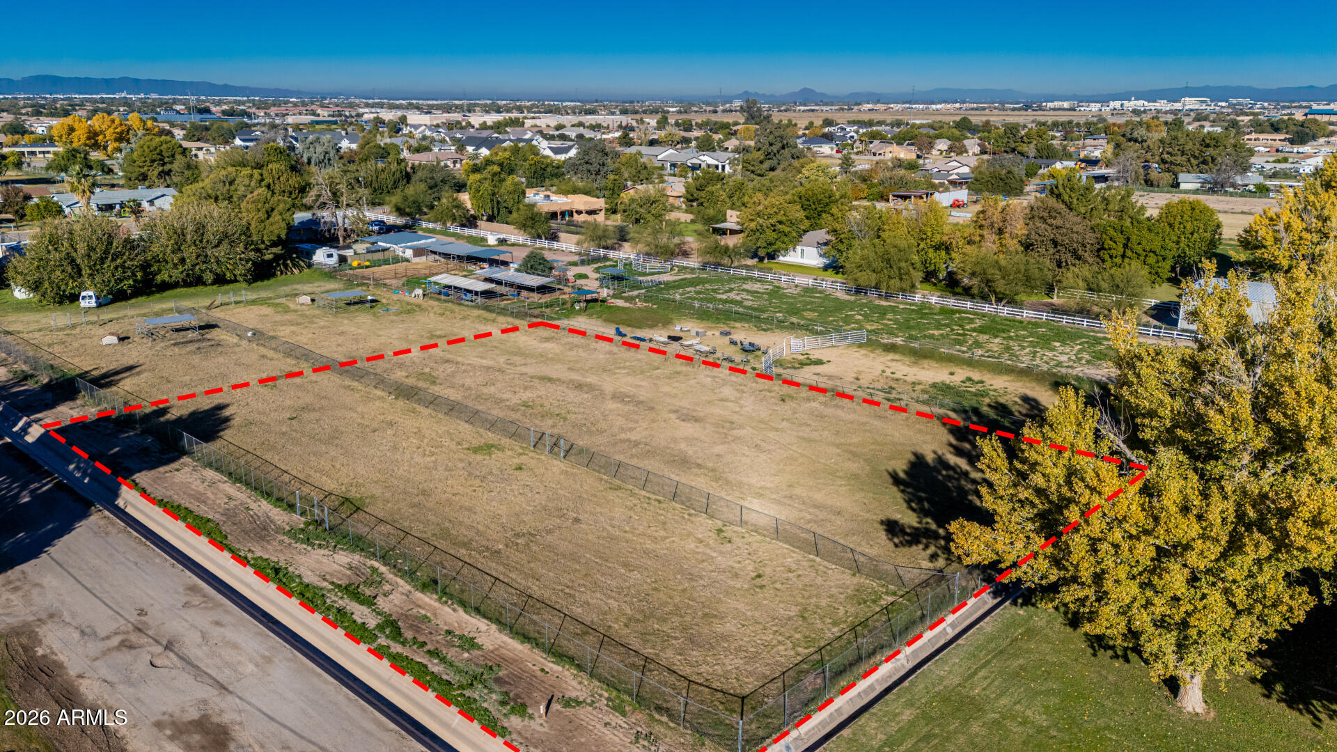 ''If you build it, they will come!''
Welcome to an exceptional Field of Dreams opportunity in South Gilbert.
Presenting a rare 1+ acre irrigated estate lot in one of Gilbert's most coveted enclaves. With no HOA, horse privileges, and expansive open space, this property offers the freedom to craft a truly bespoke residence and lifestyle.
Unlike typical vacant parcels, this lot features lush, established green grass, creating a stunning natural canvas and offering meaningful savings on future landscaping. Affordable irrigation supports the effortless creation of manicured grounds, private gardens, citrus groves, and resort-style outdoor living. The generous acreage provides ample room for a luxury custom home, guest casita, next-generation suite, RV garage, or designer workshop, or equestrian amenities. Whether your vision includes a private retreat, family compound, or self-sustaining estate, this property delivers remarkable versatility.

Formerly a county island and now annexed into the Town of Gilbert, this setting preserves the serenity and privacy of country living while offering the convenience of city services and infrastructure.

Enjoy a refined yet relaxed lifestyle with quick access to Loop 202, moments from the area's finest amenities including Gilbert Regional Park (272 acres planned), upscale shopping and dining at SanTan Village, Topgolf, and an array of entertainment destinations. The property is also situated within a highly regarded school district.

Opportunities to acquire irrigated acreage of this caliber in Gilbert are exceedingly rare. Whether you choose to build immediately or secure this property as a long-term investment, this is a distinctive offering with extraordinary potential.