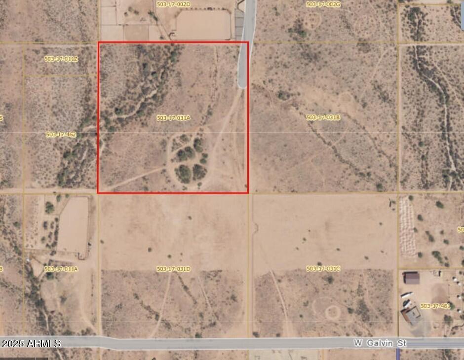 Highly sought after 10 acres of horse property in a wonderful community of ropers and racers.  This lot has so much potential for ranch, rodeo or retirement.  Square 10 acres has a little floodway on the NW corner but the majority is fully useable. Power is right on the road frontage! Come build your dream ranch in a great neighborhood. Deeds restrict the area to site built homes.