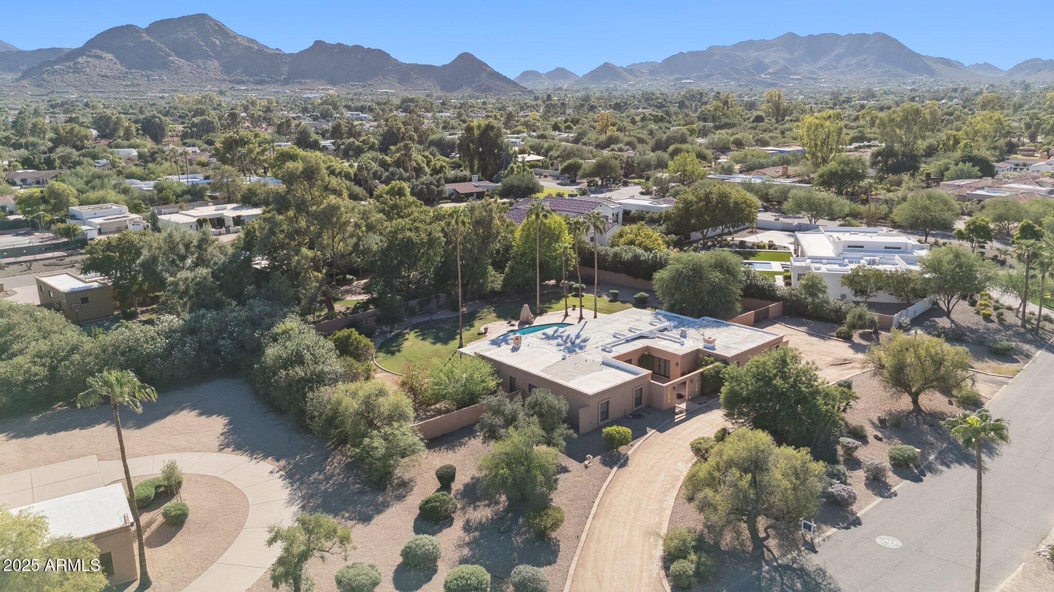 Attention Builders & Visionaries! This rare Paradise Valley opportunity offers a prime north/south-facing lot.