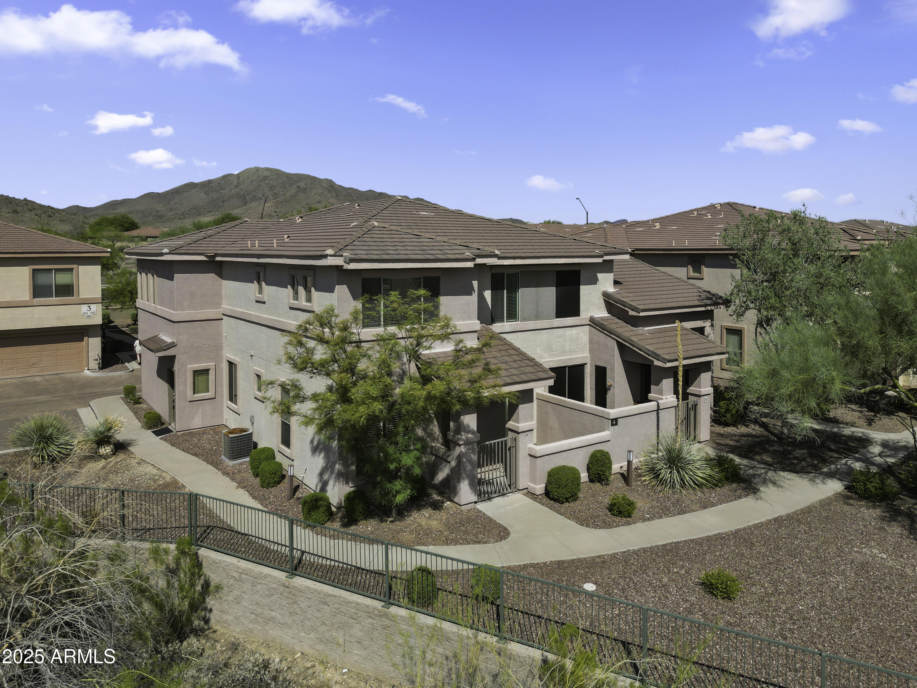 The Gavilan Vista: Elevated living in Anthem. This stunning 3-bed, 3-bath townhome offers secure, low-maintenance living in an exclusive gated community. The open-concept main level leads to a private patio with desert views. A desirable ground-floor bedroom and full bath offers flexibility. Upstairs, the primary suite features an upstairs laundry room. Enjoy the community pool just steps away, plus a 2-car garage. HOA Includes: Water, sewage, roof, blanket insurance, gate access, and all Anthem amenities (water parks, pools, tennis, basketball, pickleball, childcare, indoor/outdoor basketball, and trails). Perfectly located near Outlets and with easy I-17 access for an effortless commute. Anthem Vibes.