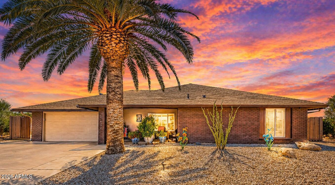Experience elevated living in the heart of Sun City West's premier 55+ community w/SOLAR 100% PAID OFF!!! This fully remodeled residence showcases exceptional craftsmanship and high-end finishes inside and out, offering true move-in luxury. A stunning designer kitchen, spa-inspired baths, and thoughtfully curated details create a warm, sophisticated atmosphere throughout. The beautifully designed backyard invites both quiet relaxation and effortless entertaining. Major upgrades include paid-off solar, new roof, new HVAC for efficiency and peace of mind. Look at the ''Upgrade Document ''   for complete details on remodeling done on this beauty. Homes of this quality and finish are rarely available-an exceptional opportunity for the buyer who values comfort, style and turnkey living!! - 17822 N 131st Avenue, Sun City West - Upgrades
-Paid off Solar, $26,500, 1/2025, Module Model: REC460, 24 panels, Tesla Inverter
-Roof, $23,079, 11/2024, Removed old roof, installed 15 lb felt underlay, laminated composite shingle rfg, new drip edges, new ridge caps, new ridge vents, next exhaust caps and new pipe jacks
-Gutters, $2,891, 12/2024, 6 inch gutters in front and rear home with 3 x 4 13 inch downspouts that go into a  3 inch pvc drain into a Bubble Box to keep water away from the foundation
-Block Fence, $24,200, 10/2024, Permitted by the city and approved by Sun City West, 237 linear feet of 6 feet tall with 6 foot custom gate, Custom Separate Dog Run Area with Doggie Door
-Puragain Water Filtration System & Reverse Osmosis, $5,899, 8/2024, Filtersorb Whole House System and 6 stage Alkaline System
-Pergola in Rear Yard, $11,150, 10/2024, 24 foot by 18 foot alumawood Solid Pergola in Spanish Brown with 2 ceiling fans, 6 recessed LED lights and a 7 foot by 8 foot solid media wall
-New AC, $6,980, 5/2024, 5 ton heat pump package, new duct work and new stand on roof for AC
-Window Treatments, $7,691, 5/2024, Blinds and Shutters t/o home
-Front Yard Work, $5,600, 10/2024, Driveway expanded on each side of driveway, 2 new garbage can holes installed, new drip system
-Backyard Work, $57,600, 6/2025, Backyard all trees removed, gravel removed and old drip system removed. New pavers, 6x6 and 6x9 townscape slate pavers installed t/o backyard, irrigation all redone, 3 planters installed, lime tree and crype myrtle planted, 2 shade sails with 4 x 4 poles dug 6 feet deep in concrete footers with govee lights.
-Car Charger for Electric Vehicle, $3,200, 9/2025, Charge Point electrical run for charge point EV car charger and installed "hard wired" for faster charging. A Charge Point Home Flex Level 2 EV Charger J1772 - Fast Smart Battery Power Charging at Home for Electric Vehicles installed in garage
-Hot Tub  from Desert Hot Tub, $23,826 for spa and $2,200 for electrical work for the hot tub, 6/2025. The Hot Tub is available for a separate bill of sale to the buyer who buys home for $15,000. It is a Grandee Model, Alpine White, 7 seat Salt Water Luxury Hot Tub by Hot Springs Spas at Desert Hot Tub. Measures 8'4"x 7'7"x38, Freshwater IQ Ready Salt System
-In 2024 the complete interior of home was remodeled consisting of:
--New Kitchen Cabinetry of white shaker 42 inch tall, soft close hinges, plywood box construction with quartz countertop and quartz backsplash. New island installed with additional sink with waterfall edge at both ends measuring 9'4" x 4'
--New Bathroom Vanities with white shaker soft close hinges, plywood box construction with quartz countertops
--New Sinks and Fixtures, Kitchen stainless steel sinks. Stainless steel bar sink, both come with cutting boards and disposals. Faucets are matte black. Bathrooms have under mount white sinks, brass finish faucets. Laundry has freestanding stainless steel laundry sink with a deep bowl and stainless steel faucet.
--New bathroom Showers and Fixtures, New large format shower tile. Floor to ceiling and wall to wall tile at both bathrooms. Delta shower fixtures at both bathrooms. Large full length shower niches. Shower glass door entry. Decorative tile flooring in both bathrooms.
--New Bathroom Mirrors, Front and backlit, dimmable wall mirrors with anti-fog, shatter proof and 3 color options.
--New Plumbing, Whole house to the main.
--New Toilets, Brand-Delta.
--New Vinyl Plank Flooring throughout entire home, Woodley Oak Waterproof Rigid Vinyl Plank Flooring, 6 inch wide by 48 inch long
--New Lighting throughout entire home
--New Ceiling Fans, throughout entire home
--New Drywall and Texture, knock-down finish. All walls and ceilings refinished.
--New Door Casing and Baseboards, Flat craftsmen style, painted finish, Casing 2.5". Baseboards 3.5"
--New Closet Shelving Throughout Home, Wood construction, painted finish, shelf and pole and shoe storage at bedroom closets, linen has full height shelves and pantry has full height shelves. Closet poles are stain grade.
--New electrical redesign per new floor plan
--New Windows Throughout Home, White vinyl, dual pane, Low E glass and sliders by Avanti.
--New Exterior Sliding Door, White vinyl, dual pane, Low E glass, fiberglass.
--New Interior Doors, 2 panel shaker, hollow core, contrasting paint color to walls, matte black levers-Baldwin.
--New garage door, standard, painted finish.
--New paint, interior and exterior. Front porch open and enlarged.
--New Appliances, Frigidaire, stainless steel, French door refrigerator, electric stove.
--New epoxy flooring in garage