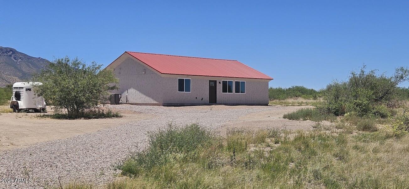 Best price for Brand New construction on 8 Private acres.  Low maintenance stucco and Lifetime metal roof.  Save on utilities with this high efficiency site-built home and spray foam insulation!  Large windows with Amazing Mountain views.  Real wood trims, Vaulted ceiling, Granite counters, 
Real wood cabinets, stainless appliances, Electric Fireplace, custom tile in shower.  Located in a private area of custom homes. Come see this great deal before its gone!