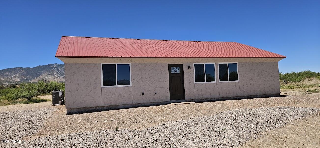 Best price for Brand New construction on 8 Private acres.  Low maintenance stucco and Lifetime metal roof.  Save on utilities with this high efficiency site-built home and spray foam insulation!  Large windows with Amazing Mountain views.  Real wood trims, Vaulted ceiling, Granite counters, 
Real wood cabinets, stainless appliances, Electric Fireplace, custom tile in shower.  Located in a private area of custom homes. Come see this great deal before its gone!