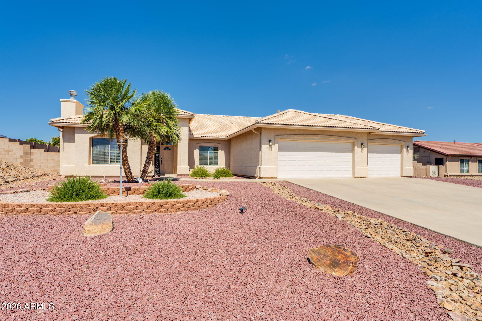 Welcome home to this beautifully updated 3-bedroom, 2-bath residence with a separate office/den, ideally situated on almost a ½-acre lot in the heart of town. Enjoy the freedom of no HOA, and room for all your toys thanks to the 3-car garage, RV gate and full 50-amp hookup.

Inside, you'll find the tastefully remodeled kitchen featuring elegant quartz countertops, new appliances, and modern finishes that make everyday living and entertaining a pleasure. Home also features freshly painted interior and newer carpet in the bedrooms.

Step outside to a professionally landscaped yard and mountain views. With its generous lot size, thoughtful upgrades, and central location close to shopping, dining, schools, and amenities, this property offers the lifestyle you've been looking for.