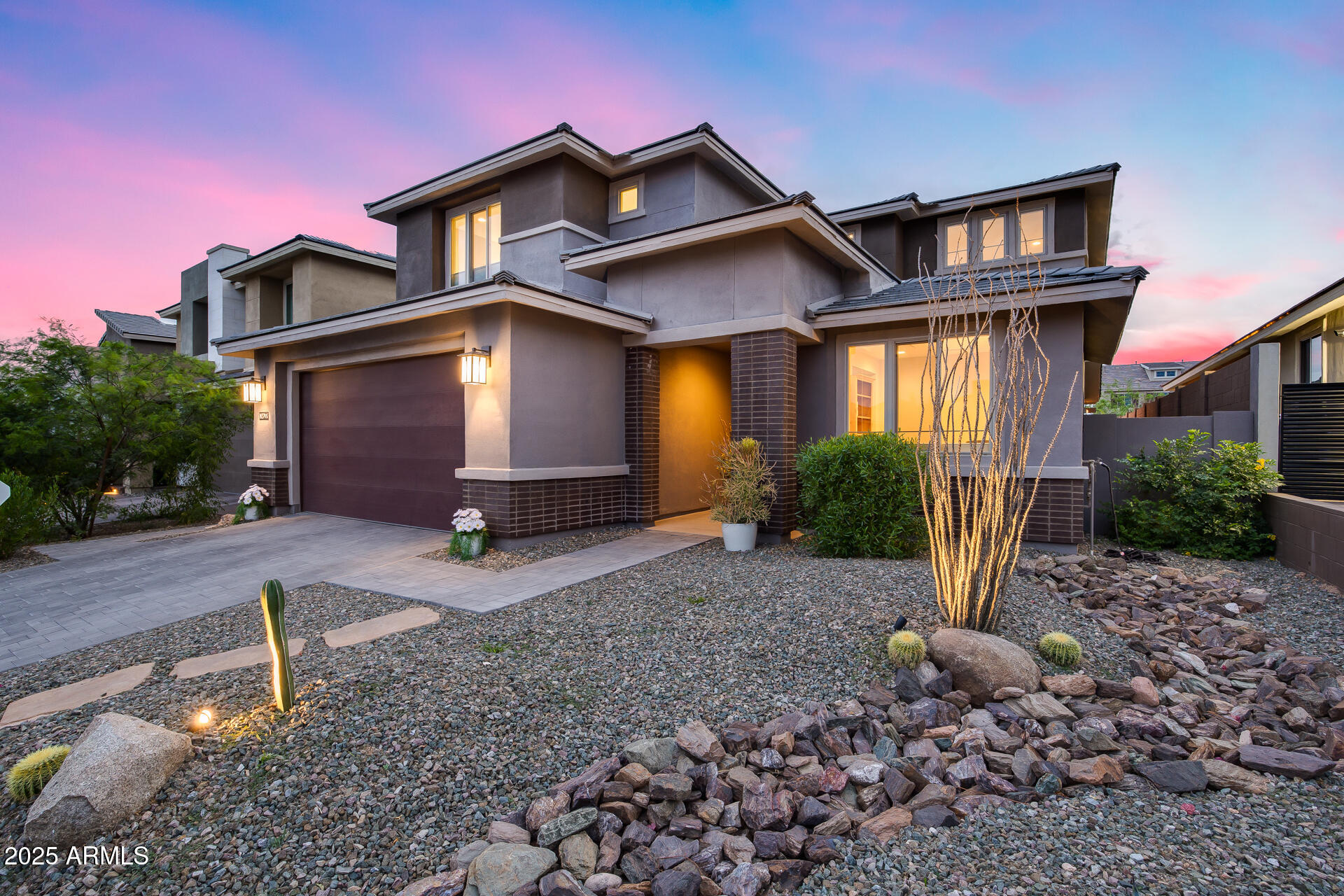TURNKEY STUNNER, NO NEIGHBORS BEHIND, GATED COMMUNITY! Designed to fit your life w/ modern comfort & flexible spaces! An Open floor plan w/ soaring ceilings & two sliders for effortless indoor/outdoor living. Bonus rooms include a private office & spacious loft. This upgraded gem features a chef's dream kitchen w/ Chef Lux layout, gas cooktop, 42'' soft-close cabinets, quartz counters, tile backsplash & large kitchen island. The primary bedroom is downstairs & has a massive master closet! The backyard is built to RELAX w/ an extended patio, alumawood cover & synthetic turf for a low-maintenance design. PLUS, all tile flooring down & LVP up, soft water & R/O systems! The extended, insulated 2.5 car garage is a bonus! Minutes from the 101/51, Mayo, Citi North & Desert Ridge Marketplace!