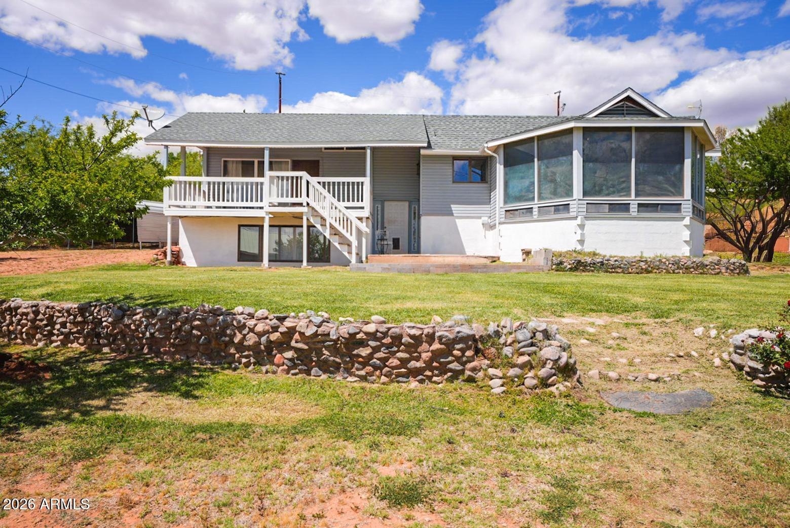 This 2,312 sq ft home sits on a full acre, offering space, functionality, and room to make it your own. The property is serviced by a private well, adding to its long-term value. Recent updates include a brand new roof and fresh interior paint, providing a solid starting point for the next owner.

A standout feature of the property is the impressive 1,600 sq ft garage/shop, complete with a car lift that conveys--ideal for car enthusiasts, hobbyists, or anyone in need of a versatile workspace.

With plenty of outdoor space and practical improvements already in place, this property offers a great opportunity for those looking for a home with added utility and potential.