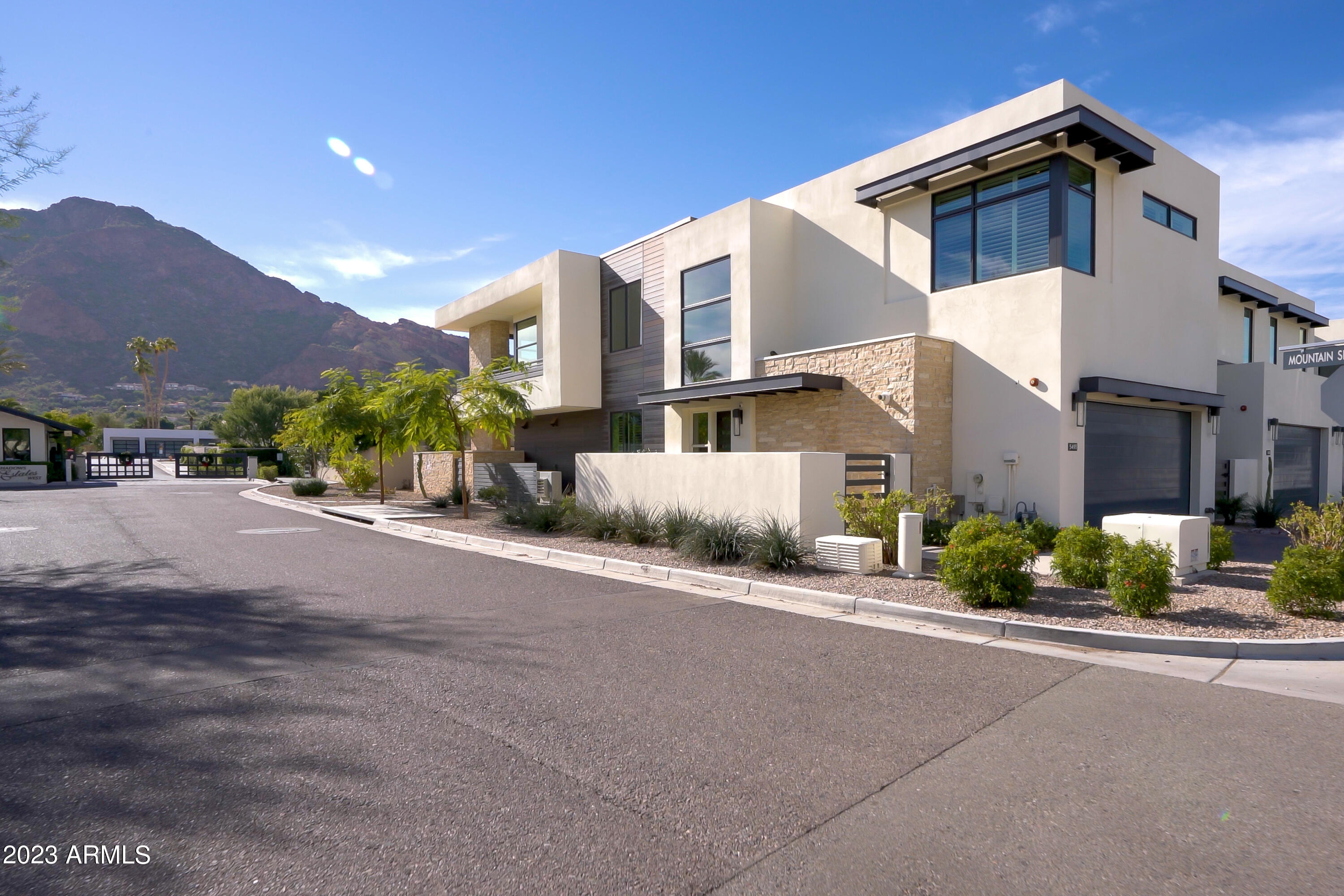 Luxury Comfort Villa at Mountain Shadows Resort Paradise Valley. Resort living at its finest with full amenities at adjacent resort. Enjoy the best views of Camelback Mountain from the 800+ sq. ft. outdoor deck. This Villa has 20 ft. high entry foyer with private elevator/stairs to living level. Designer features include, Sub Zero refrigerator, Wolf combo dual fuel range oven and microwave.  Asko dishwasher, Zephyr hood, quartz countertops. 10 ft. high ceilings, 9 ft. bi-fold doors to deck, 9 ft. bi-fold from master suite to deck, indoor/outdoor fireplaces, 3-bedroom, 3.5-bathroom, 2 car private driveway, 2 car private attached garage, 24 hr. guarded entry.  This house has every upgrade you can think of, nothing was left out.