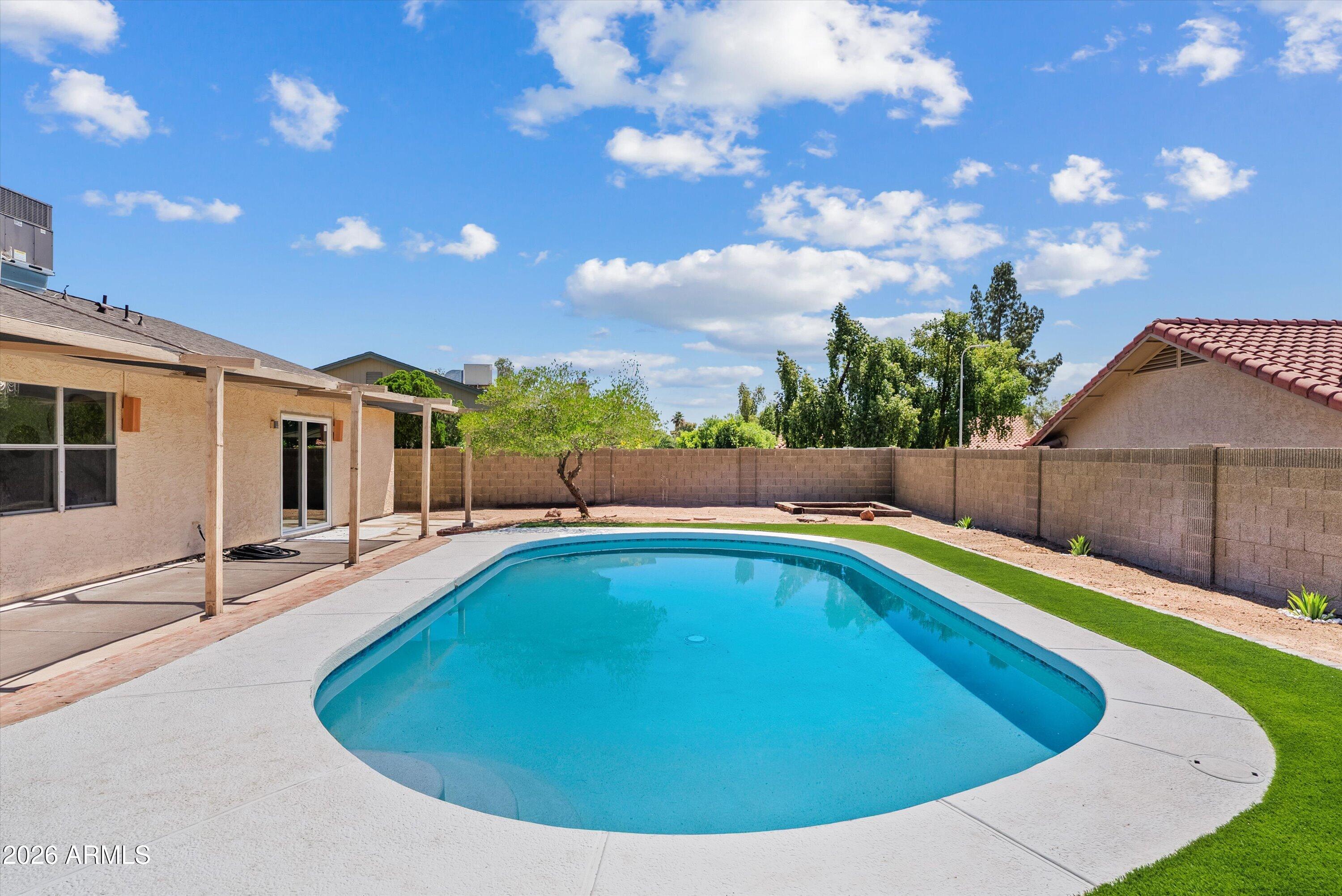 Welcome to this fully updated 4-bedroom, 2-bathroom home nestled in the highly sought-after Ahwatukee community! Offering 1,514 square feet of thoughtfully designed living space on a spacious lot in a well-established community. 
From top to bottom, the big-ticket items have been taken care of -- featuring a brand new full replacement roof, new HVAC system (2025), and a new water heater (2023), giving you peace of mind for years to come. 
Brand new luxury vinyl plank flooring runs throughout the entire home, complemented by fresh interior paint, new baseboards, doors, bathroom vanities, and a fully redone kitchen.
Out back, enjoy your own private oasis featuring a large backyard, a newly resurfaced Pebble Tec pool, and brand new turf all ideal for relaxing or hosting guests year-round.