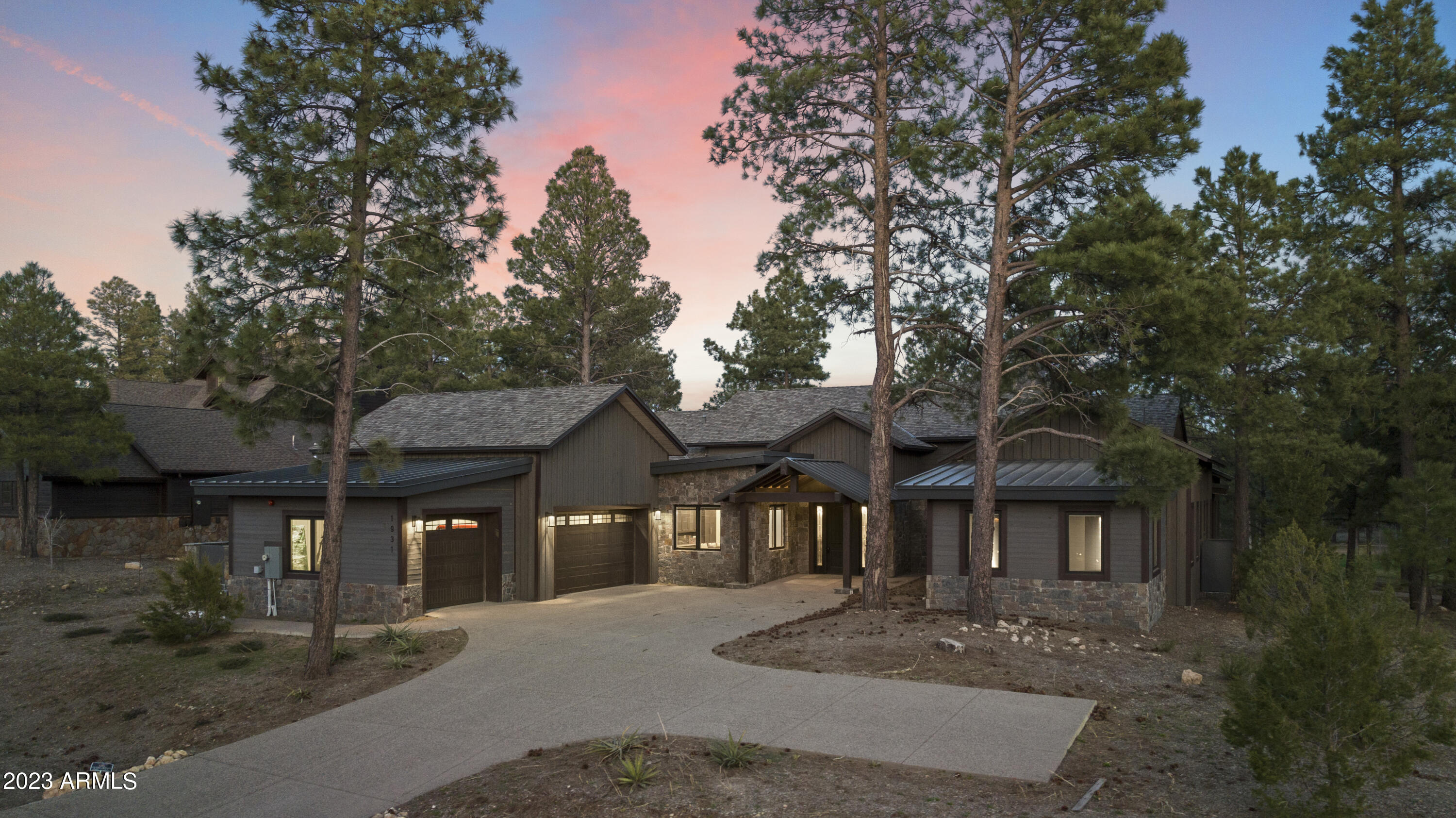 Welcome to your dream home in the heart of Flagstaff's premier golf course community, Pine Canyon! Turn-key ready and just 200 yards from the 9th green, this private and stunning single-level contemporary home offers unmatched views of the fairways and woodlands, inviting you to indulge and unwind. Recently remodeled by Salcito Custom Homes, the spacious split floor plan boasts a gourmet kitchen with SS appliances, a walk-in pantry, and a large island that's perfect for entertaining. You'll appreciate the attention to detail and luxurious touches throughout that make this home truly special. The primary is a true oasis of comfort and sophistication, featuring dual vanities, in-floor heating, and a large walk-in custom closet. True privacy and convenience abound-see more & video! True privacy and convenience abound - this home is fit for comfort and luxury, and includes spectacular spaces, including the covered patio w/heaters, a built-in BBQ, gas firepit, and an effortless outdoor dining experience soaked in views of woodlands and of the 9th green. Just a 2 minute ride on the cart path to the celebrated modern culinary destination of Morrish Station, where exceptional culinary and nostalgia intersect.