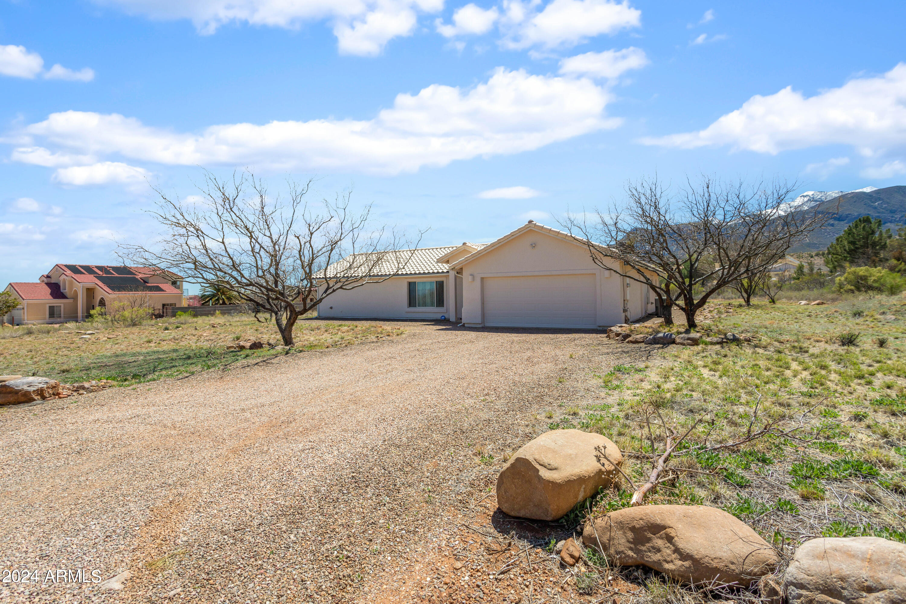 This is THE one you've been looking for! Gorgeous custom-built home on almost two acres with magnificent mountain views!  3 BR 2B, built in 2013, there is nothing for you to do but turn the key and call it home! Country living with no HOA, but still close to town with all amenities.  Enjoy quiet, starry views by night, and easy access to hiking trails by day.  Split floor plan, high ceilings, loads of light, vinyl flooring throughout, extra deep tub in master bath.  Come see this gem for yourself today!