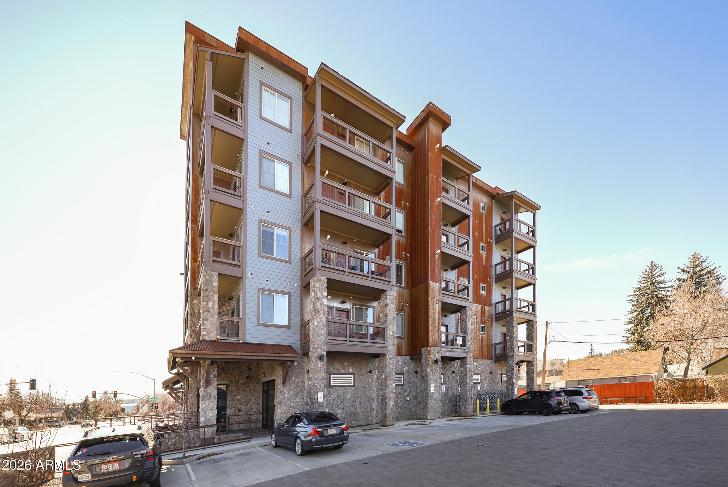 Discover upscale living in this beautifully appointed condominium near the NAU campus, where style, convenience and investment potential come together.  With easy access to shopping, dining and entertainment, this location is highly desirable for both owners and tenants.  The residence features refined finishes, a private patio for relaxing and access to a stunning rooftop deck ideal for entertaining.  Just 30 minutes from Snowbowl Ski Resort.  This condo also makes a great rental property--perfect for long-term or seasonal demand--offering an exceptional blend of lifestyle appeal and income opportunity.