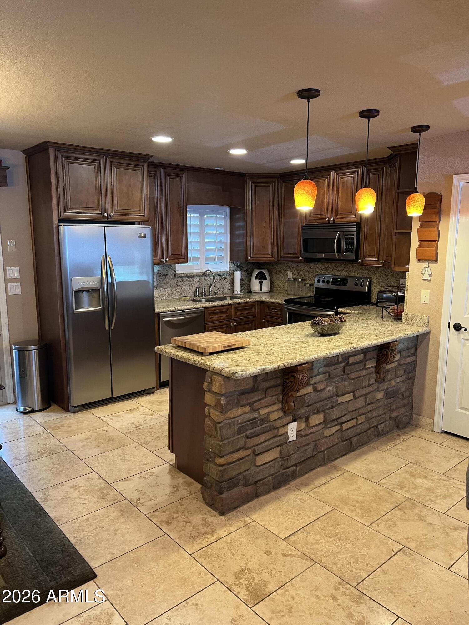 Fully updated 3 bedroom. 2 1/2 bath unit within the peaceful gated community of Country Pines. Home features travertine flooring, 42'' cabinets, granite countertops, newer carpet and heating system. Quiet community that features, a community pool, and gym. This is a must see and will not disappoint.