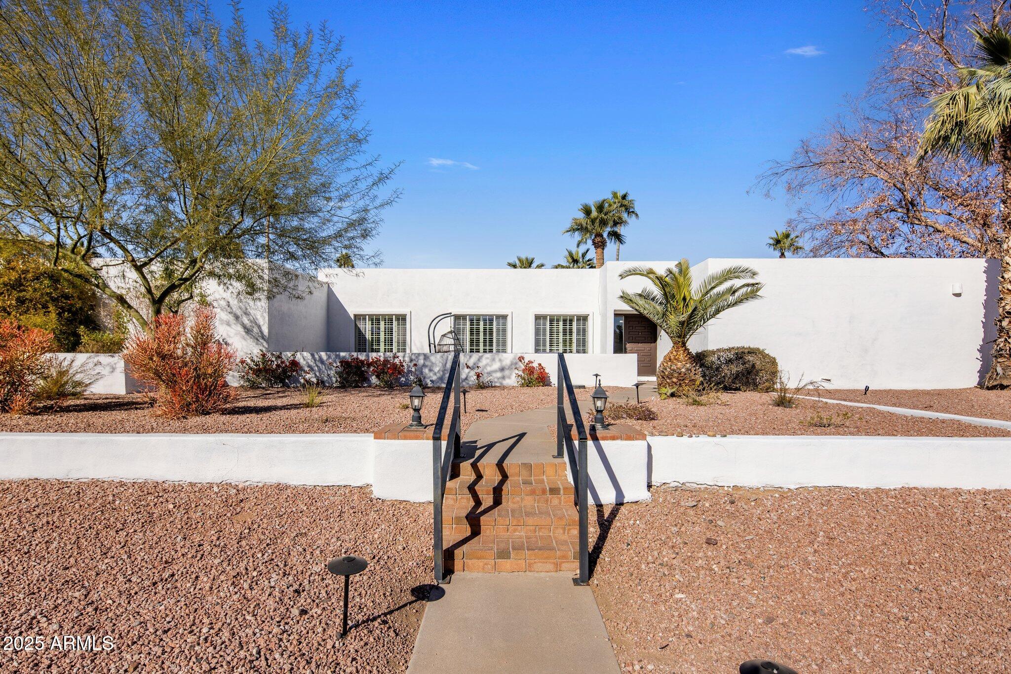 Incredible opportunity to own this expansive 6-bedroom, 4.5-bathroom home on a large lot in a prime Scottsdale location just minutes from Kierland Commons and Scottsdale Quarter. Ideal as a primary residence, vacation home, or investment property, this home features spacious bedrooms, split primary suites, a game room, theater room, wet bar, and multiple fireplaces. The resort-style backyard is built for entertaining with a heated pool, hot tub, sport court, putting green, outdoor fireplace, built-in BBQ, and abundant outdoor living space. Currently operating as a professionally managed Airbnb. Contact listing agent for additional details.