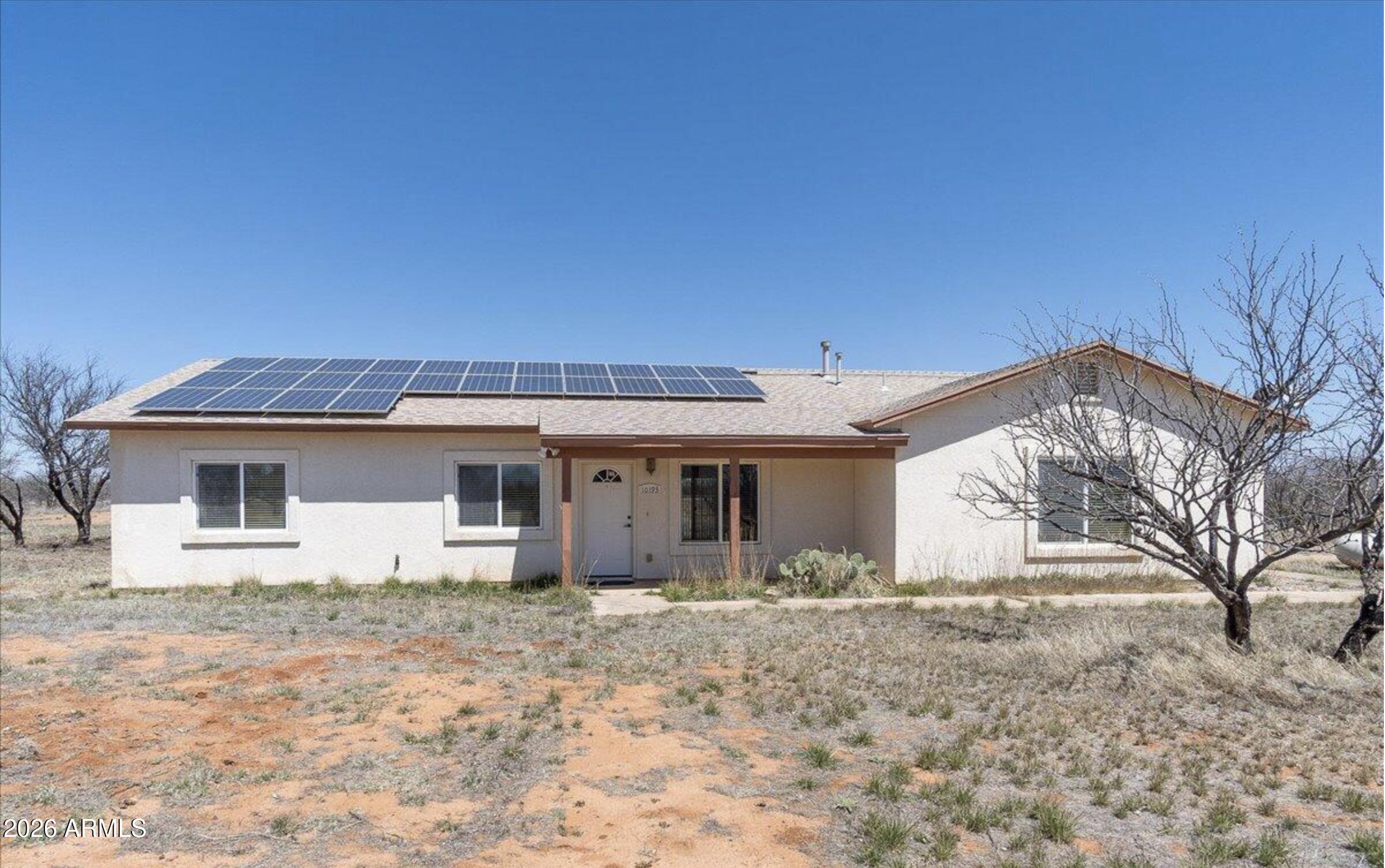 Range priced at $269,000-$279,000. Seller is motivated and willing to consider reasonable offers, including potential buyer credits/concessions.
This 4-bedroom, 2-bath home offers an open-concept layout with split-bedroom design for added privacy. The kitchen features generous cabinet storage, a center island with bar seating, and a gas cooktop. The primary suite includes a walk-in closet, and the attached 2-car garage offers laundry hookups.
Situated on 4 acres with mountain views, the property includes a prepaid solar lease through 2031, providing added utility savings. Roof replaced approximately 1 year ago. Property is served by private well and septic system.