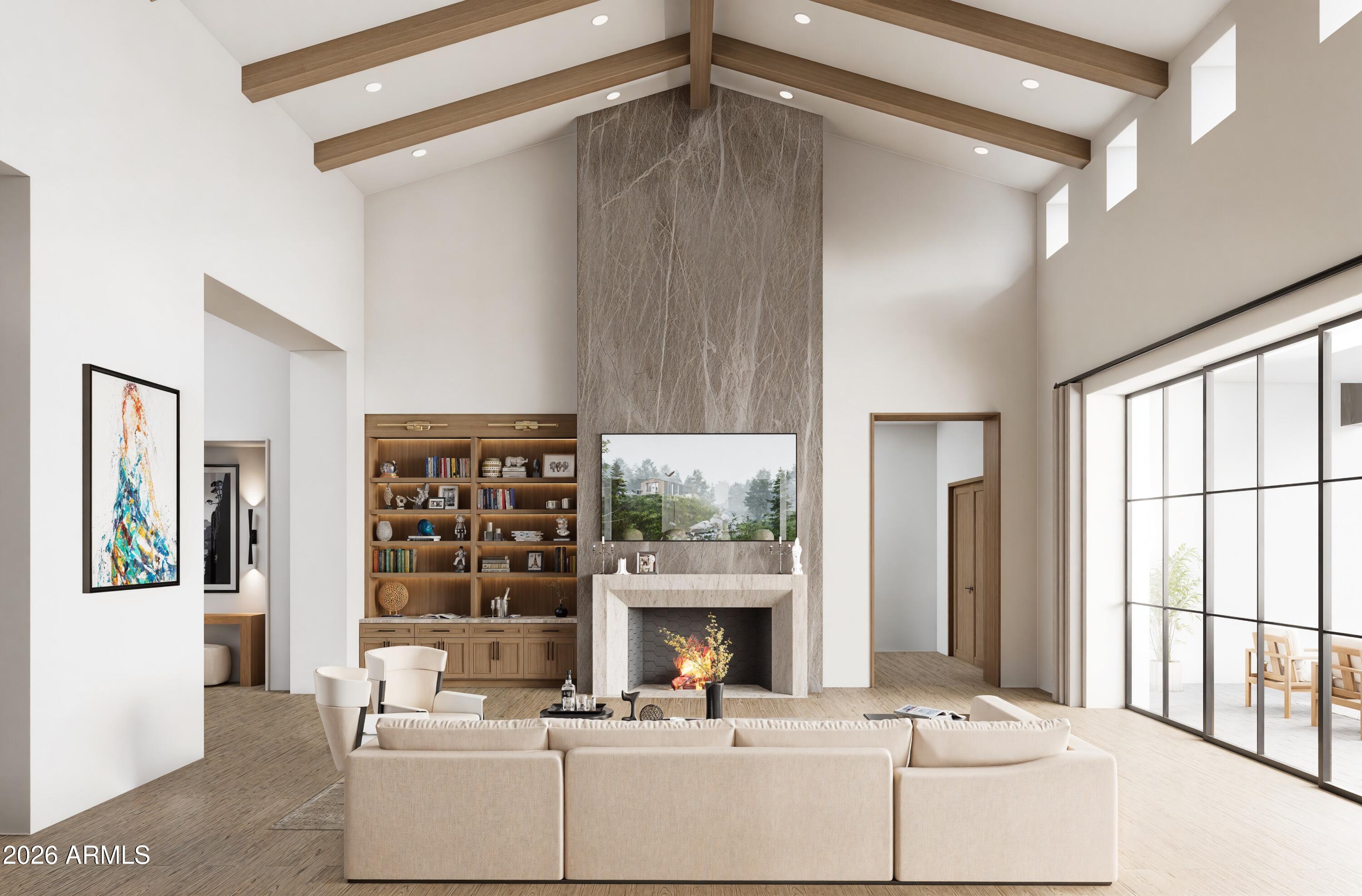 Planned completion Quarter 3 2026! This custom residence, built by Armstrong Construction Group and designed by Tom Mooney Design, blends modern luxury with timeless architecture. The main home offers 6,294 sqft with soaring 20 ft vaulted ceilings, 4 beds, 5 baths, an office with separate entrance, and a game room. This is complemented by a 677 sqft 1 bed/1 bath guest house, all set on just under an acre. Interiors curated by Janet Brooks Design feature stunning finishes and top of the line appliances including Sub Zero and Wolf. The open floor plan is filled with natural light and includes a chef's kitchen with a hidden back kitchen, a separate pantry, a secondary living wing, and an oversized laundry room with dual washers and dryers plus a dog wash. The primary suite and office occupy a private wing, with the office offering its own entrance and patio. Outdoor living showcases an extended pool, ramada with fireplace, and generous entertaining areas designed for year round enjoyment.