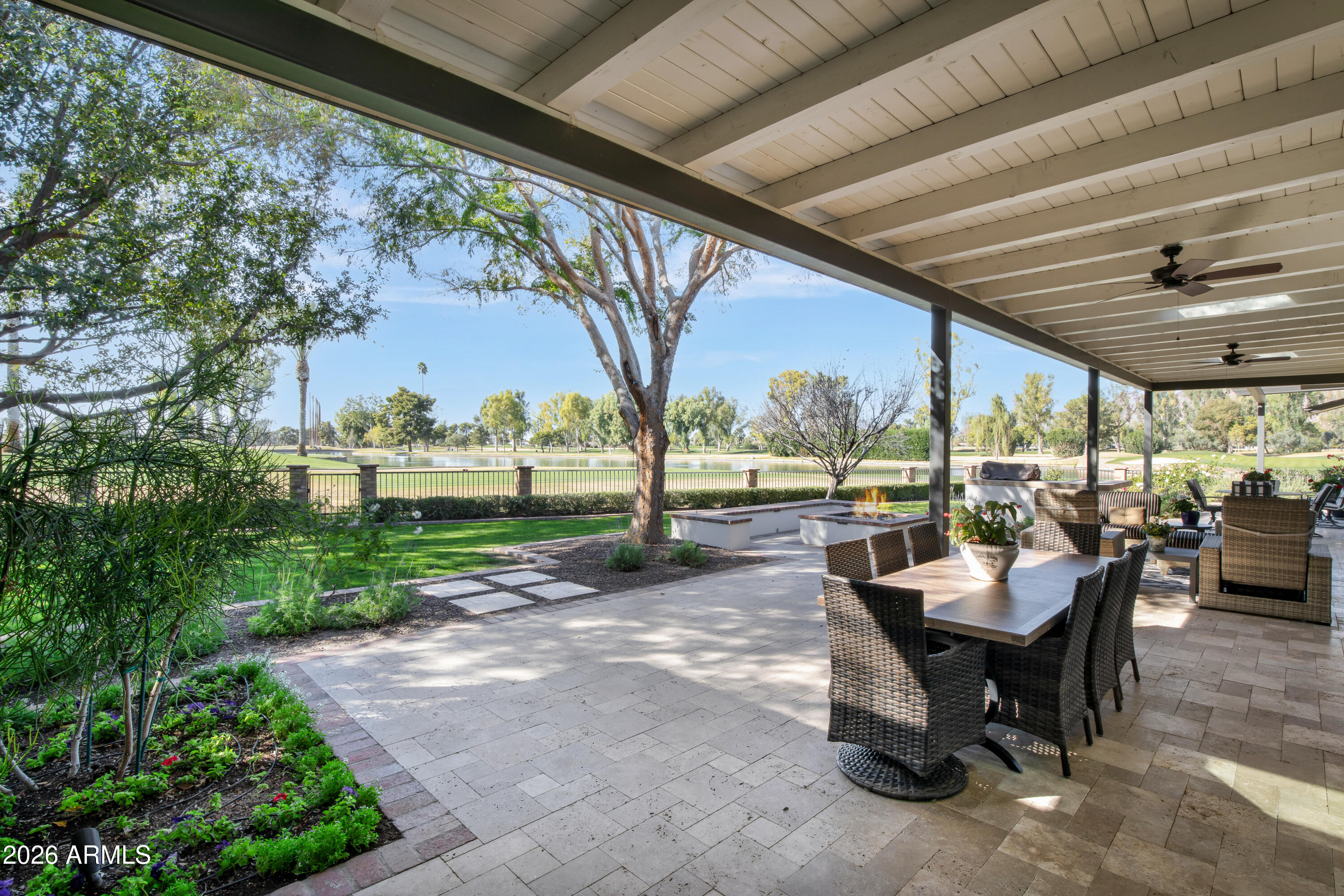 I've got some Ocean Front Property in Arizona and from the back porch you can see the TEE! Views! Views! Views! Located on the 4th Tee of the Arizona Country Club with expansive views of the course and the lake, sits this one of a kind home which is SIMPLY PRICELESS! Beautifully renovated with 4100', walls of glass to the back take full advantage of the setting which includes Camelback Mountain to the north and the Papago Buttes to the south. Multiple living areas, 9' ceilings, gourmet kitchen with huge island, commercial appliances, huge laundry, 3 large bedrooms with ensuite baths, 2 fireplaces in inside and fire pit out back. Enormous outdoor living to the front and back. Located in the coveted Arcadia neighborhood with close proximity to all the best restaurants and retail in town!
