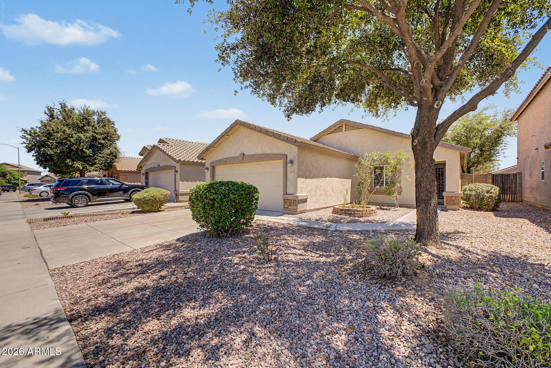 Wow! This is the complete package may your home the nicest home on the Block. The property offers 3 bedrooms plus 2 bathrooms and 2 car garage.  *Property has north south exposure with awesome backyard with lots of pergolas for extra shade and cement for all your new patio furniture because you will enjoy the artificial grass and all the shade trees this home offers. Seller just replaced the appliances with new stainless steel one new carpet and all new designer two tone paint. This home will make you feel like its yours the minute you enter. With shopping everywhere only 10 minutes away and Cardinal's stadium with great Restaurant's this is a must see.   Just show and you will sell. This home can be yours just don't wait too long it is a perfect home.