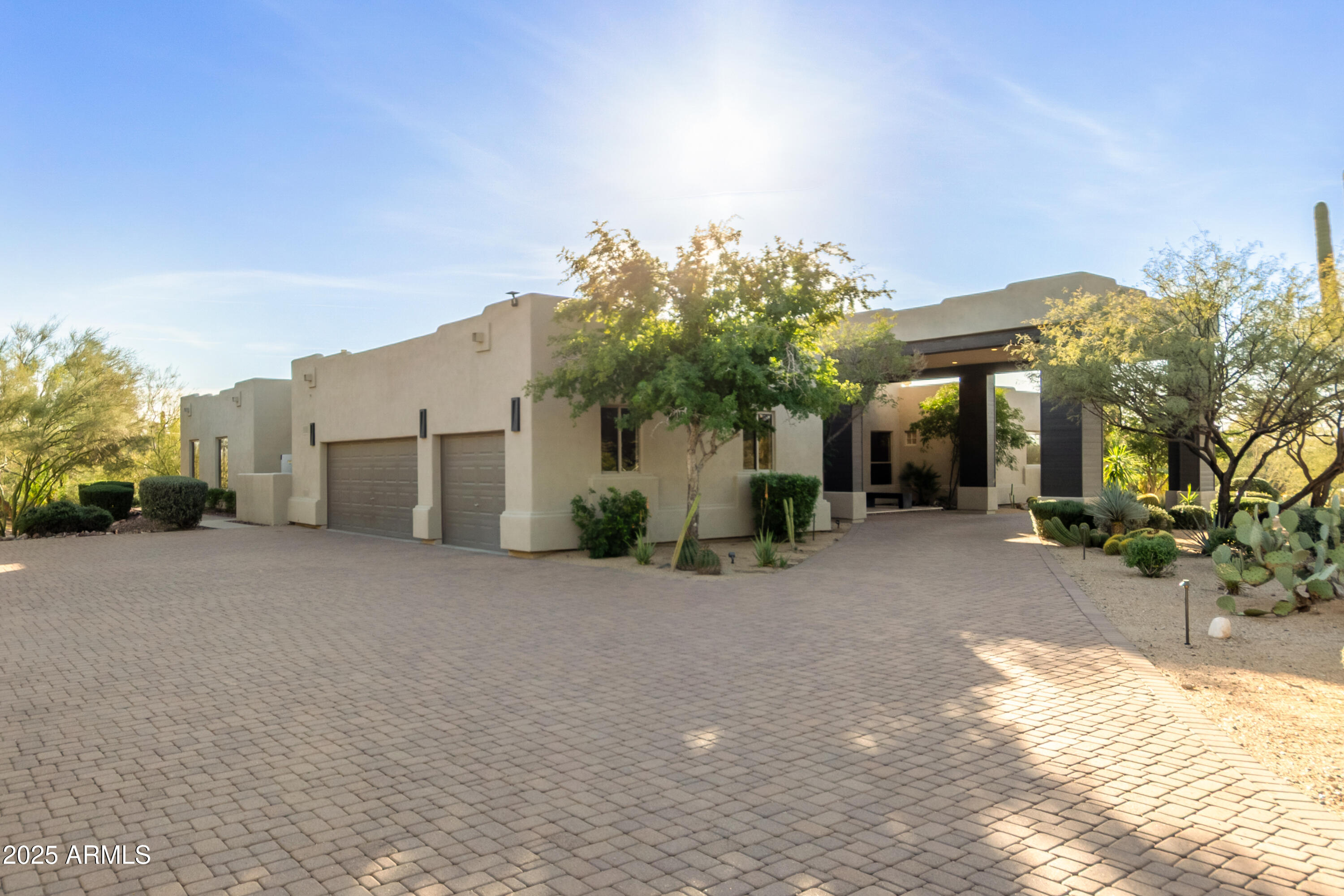 Spectacularly renovated, this property is overlooking DC Ranch with Mountain View's and city lights. The grand entry leads to a huge pivot door. The blonde wood floors and soaring ceilings opens to a wall of frameless windows and a huge great room. No expense was spared with a waterfall kitchen island, gas cooking, built in refrigerator and designer backsplash. Perfectly placed fireplace with floor to ceiling ship lap wall. The primary has an its own wall of windows, floating backlit vanities mirror, double closet and glass tile walk in shower. The offices custom wood accent wall is a great space to focus. High above the valley, the negative edge pool, elevated spa, travertine pavers and a built-in grill make this ideal for entertaining. The views are sensational.