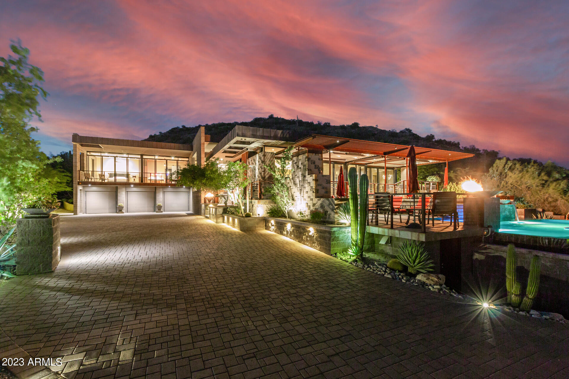 Award winning Mark Sever contemporary hillside home. Situated on Lone Mountain with spectacular mountain and breathtaking city views overlooking the infinity pool. Beautiful Tigerwood & Maple and stone floors, with floor to ceiling windows to enhance indoor/outdoor living. Upgraded chef's kitchen with Sub Zero and Wolf appliances, Miele Coffee maker, dual dishwashers, and large Butler's Pantry. Enjoy amazing views from the Master bedroom with a full wall of windows and expansive patio. Master bath with his/hers toilet rooms, jacuzzi tub, and steam shower. Theater room, cooled wine cellar, walk in safe. and elevator. A must see to appreciate the beauty of this home and views.