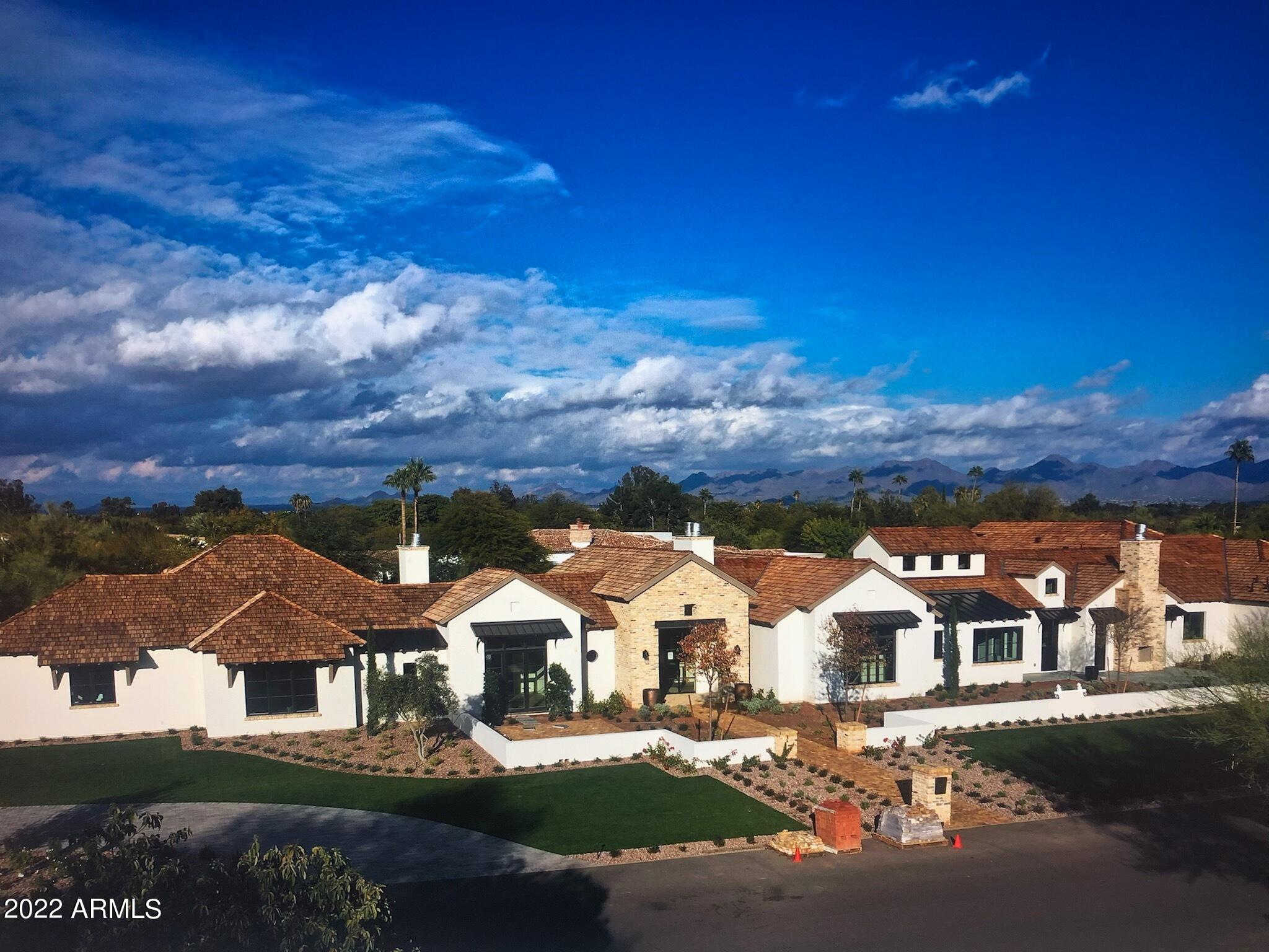 Gorgeous newly built home home in the heart of Paradise Valley. This ''Napa Modern'' exudes charm and elegance with the very finest of finishes. Built by JKD Building Group, Designed by Higgins Architecture, Interior Design by Pawling Designs and Landscape Architects Greey/Pickett.  Absolutely fabulous professional collaboration. Livable totals 7605 sq ft which includes a 750 sq ft detached Guest house. 7 bedrooms, 8 bathrooms, stunning well appointed kitchen, reclaimed beams t/o, office, media room, lovely heated pool and spa, 5 car garage.Vantage system, Gorgeous mountain views! So much more! Spectacular home is a must see! Fantastic Neighborhood!!Completion Date is Nov/Dec 2022. Floor plan and Landscape Plan PDFs are in Document tab.