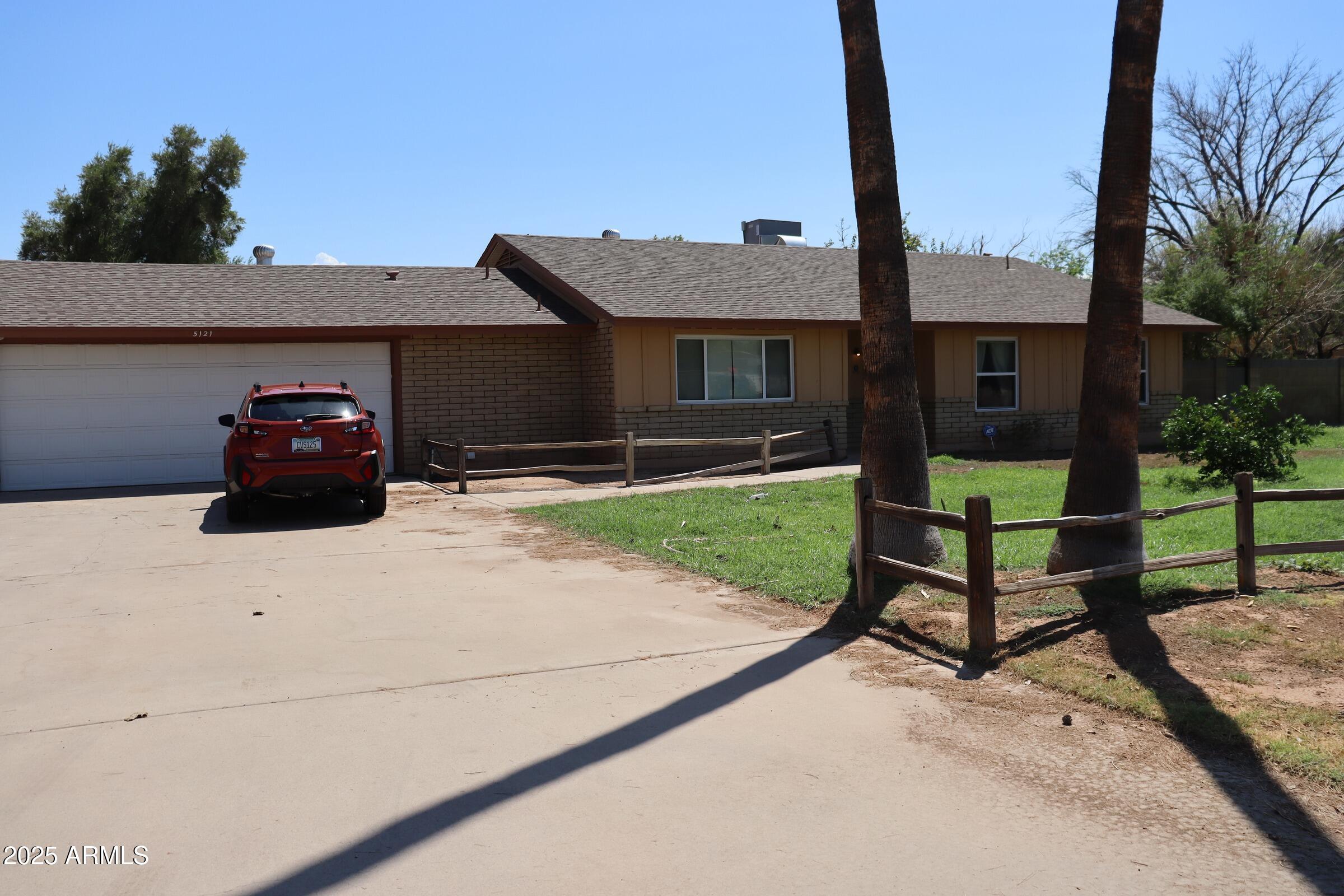 Welcome to your dream home!!! This amazing farmhouse horse property is over an acre, has a large shed, covered workspace, tack room, covered corrals, a sparkling pool with a slide...this home has it all! Kitchen is equipped with SS appliances, vinyl wood-like flooring throughout, outside office with it's own AC wall unit, what more could you ask for? Come see what the AZ country life is all about. Come see it today, this one will not last long!
