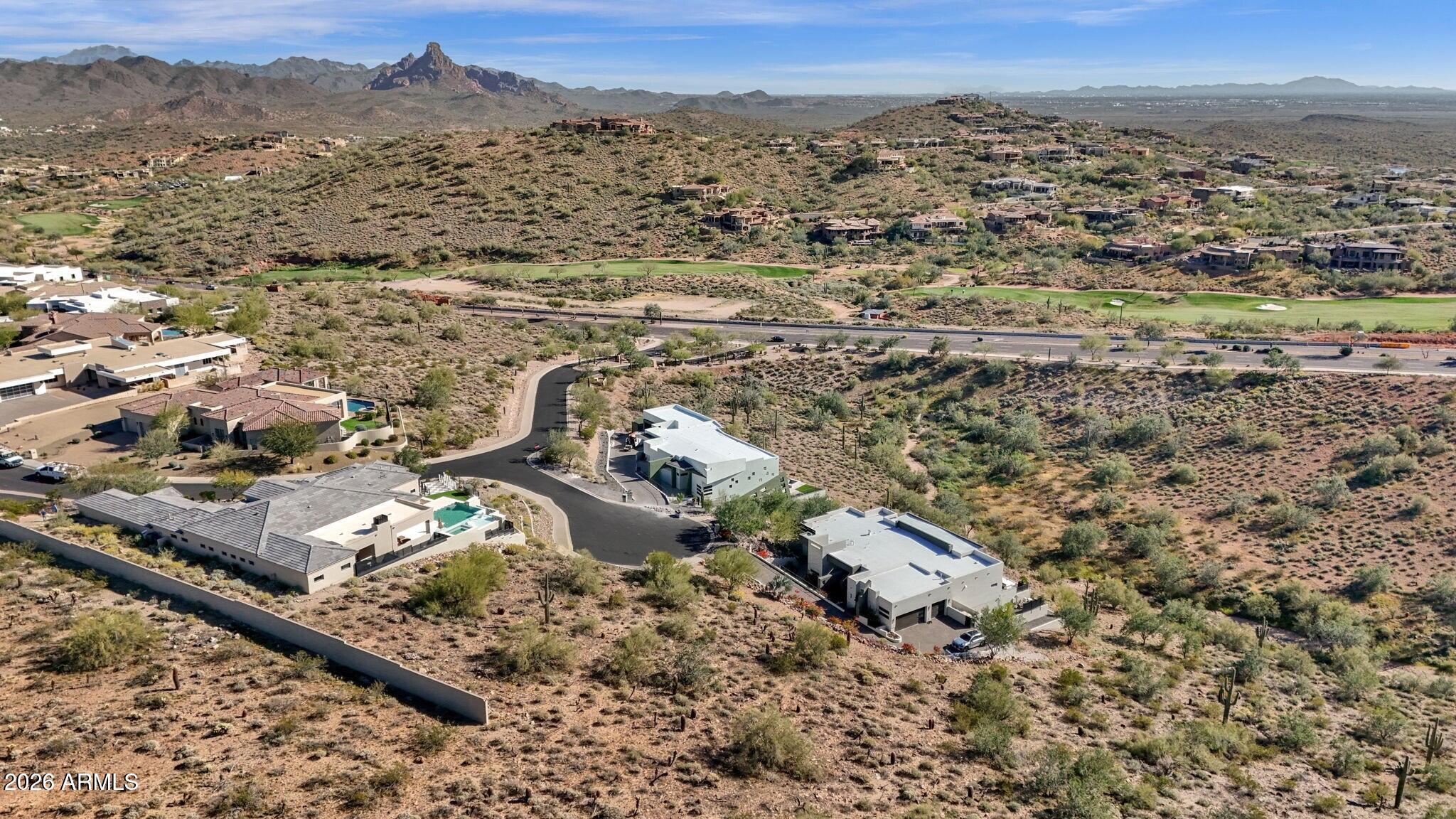 Custom one-acre homesite in the prestigious gated community of Palatial Estates. Design and build your dream residence while enjoying sweeping views of the surrounding mountain ranges and Sonoran Desert landscape. With only 19 total lots , this intimate enclave offers privacy, exclusivity, and a true luxury setting. A rare opportunity on one of the last lots within Palatial Estates to crate a custom estate in one of Fountain Hills' coveted gated communities.