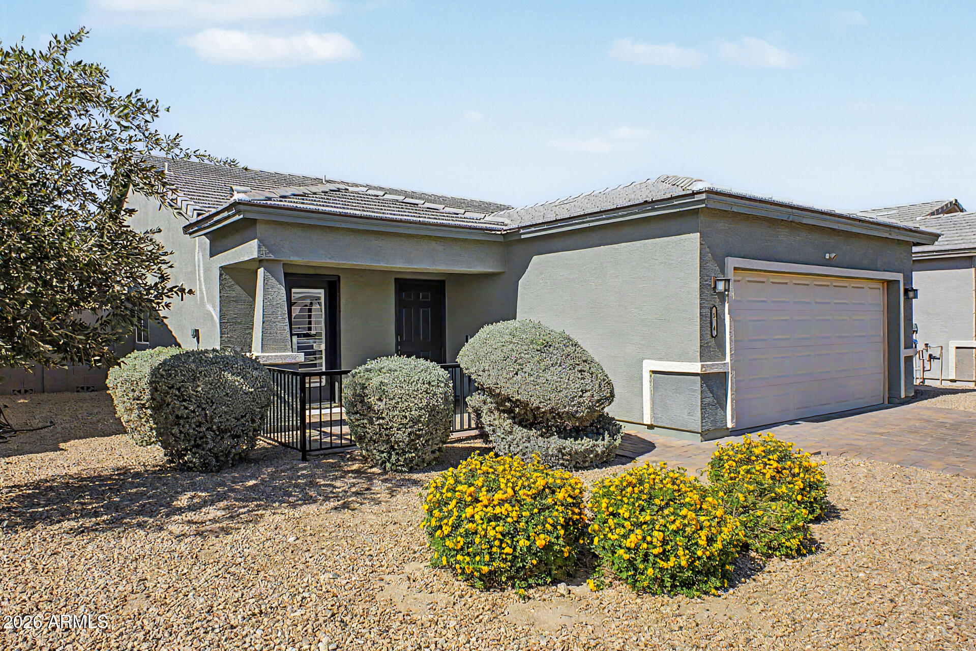 Welcome to effortless living in the gated community of Highline Estates! This absolutely gorgeous, light & bright 3-bedroom, 2-bath home is immaculate, beautifully upgraded, and truly feels like new. From the moment you arrive, the stunning curb appeal shines with a paver driveway, charming exterior details, and a spacious 2-car garage. Inside, you'll find a warm yet modern design featuring stylish wood-look vinyl plank flooring, plantation shutters throughout, a soft neutral palette, & open-concept floorplan filled with natural light. Every space has been meticulously maintained and thoughtfully designed for both comfort & style. The inviting primary suite is a true retreat, complete with a spacious walk-in closet & beautifully appointed ensuite bath featuring a walk-in shower. The kitchen offers stainless steel appliances, ample cabinetry, and seamless flow into the living and dining spaces -- perfect for everyday living and entertaining alike. Step outside and enjoy the nearby community pool and ease of low-maintenance living in a community ideally located near shopping, dining, entertainment, and everyday conveniences. Move-in ready and exceptionally cared for, this stunning home is the total package! Plus, all furniture/furnishings are available with a separate bill of sale!