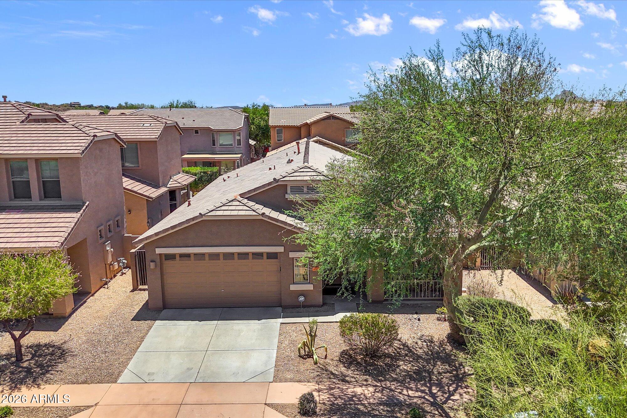 Welcome to this beautifully maintained home in the highly sought-after North Gateway area of Phoenix. Offering 3 bedrooms, 2 bathrooms, and approximately 2,113 square feet of thoughtfully designed living space, this residence combines comfort, functionality, and an unbeatable location.

The open-concept floor plan features spacious living and dining areas filled with natural light, along with a versatile den that is ideal for a home office, media room, fitness space, or playroom. The well-appointed kitchen opens seamlessly to the main living areas, creating the perfect environment for both everyday living and entertaining.
The private primary suite provides a relaxing retreat, while the secondary bedrooms offer ample space for family and guests. Step outside to enjoy the low-maintenance backyard, thoughtfully designed for Arizona living and outdoor enjoyment.

Ideally located near community parks, pools, shopping, dining, and top-rated schools, this home also offers convenient access to I-17, Loop 303, and the rapidly growing TSMC semiconductor campus. With major employers, new retail developments, and significant economic growth transforming the North Phoenix corridor, this location presents exceptional convenience and long-term value.

Whether you're looking for a primary residence, a relocation opportunity, or a home near one of Arizona's largest employment hubs, this move-in-ready property delivers the perfect combination of lifestyle, comfort, and accessibility.

Don't miss your opportunity to own in one of North Phoenix's most desirable and fastest-growing communities.