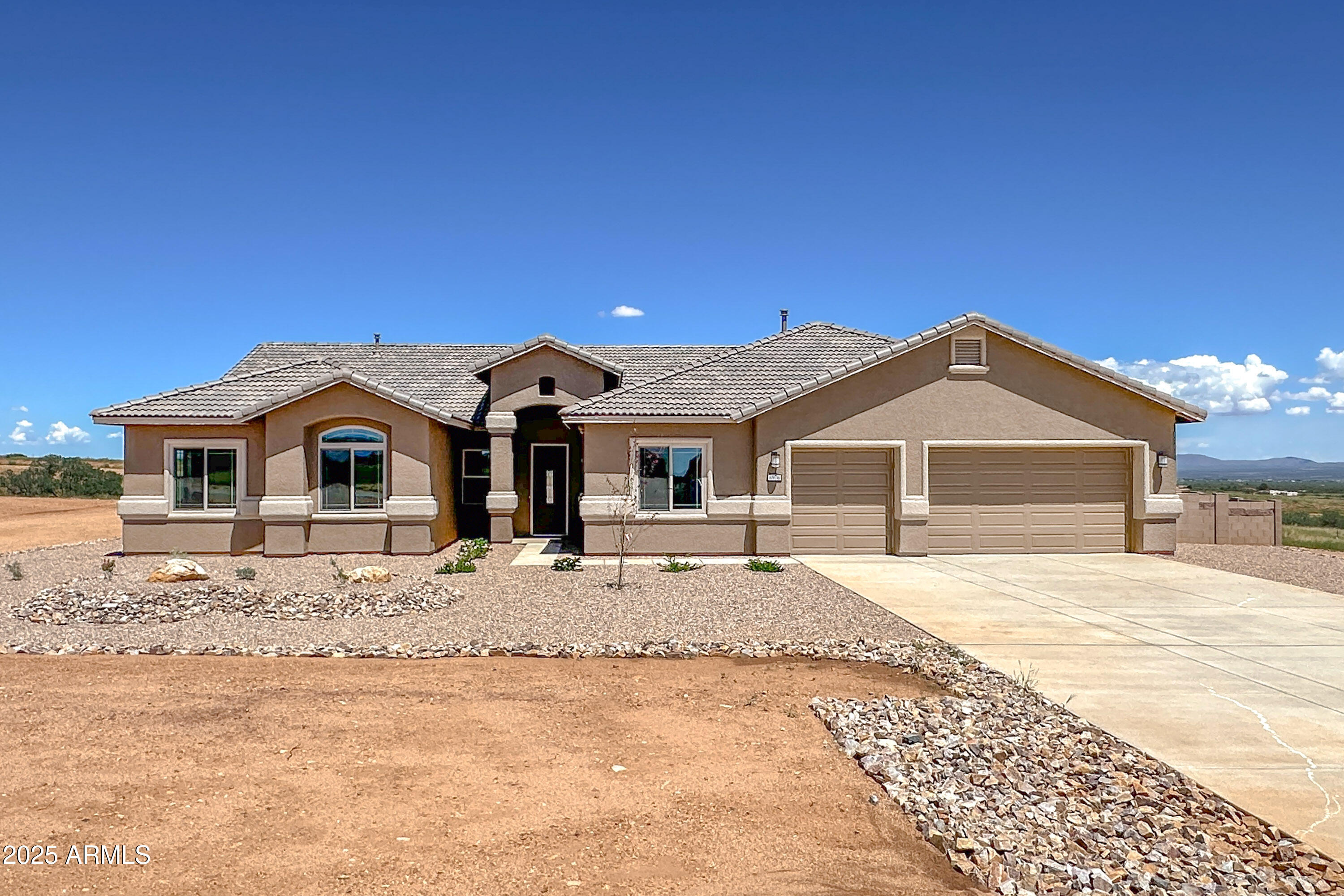 Beautiful 5BD/2.5BA, 2971 sqft 3-car garage new construction home on a 3acre lot in the desirable Kings Ranch community in Hereford! Kitchen features 42'' upper cabinets, soft close doors/drawers, pull out trash & pot drawers, granite countertops, tile backsplash, 36'' gas cooktop, stainless appliances including micro/wall oven, and island. Wood-look tile flooring throughout living areas. Split plan, master suite features tiled 9'x3.5' walk-in shower with seat & niche. Baths feature executive height soft close vanities, granite counters & undermount rectangle sinks. Environments for Living Guaranteed & HERS Rated Home.