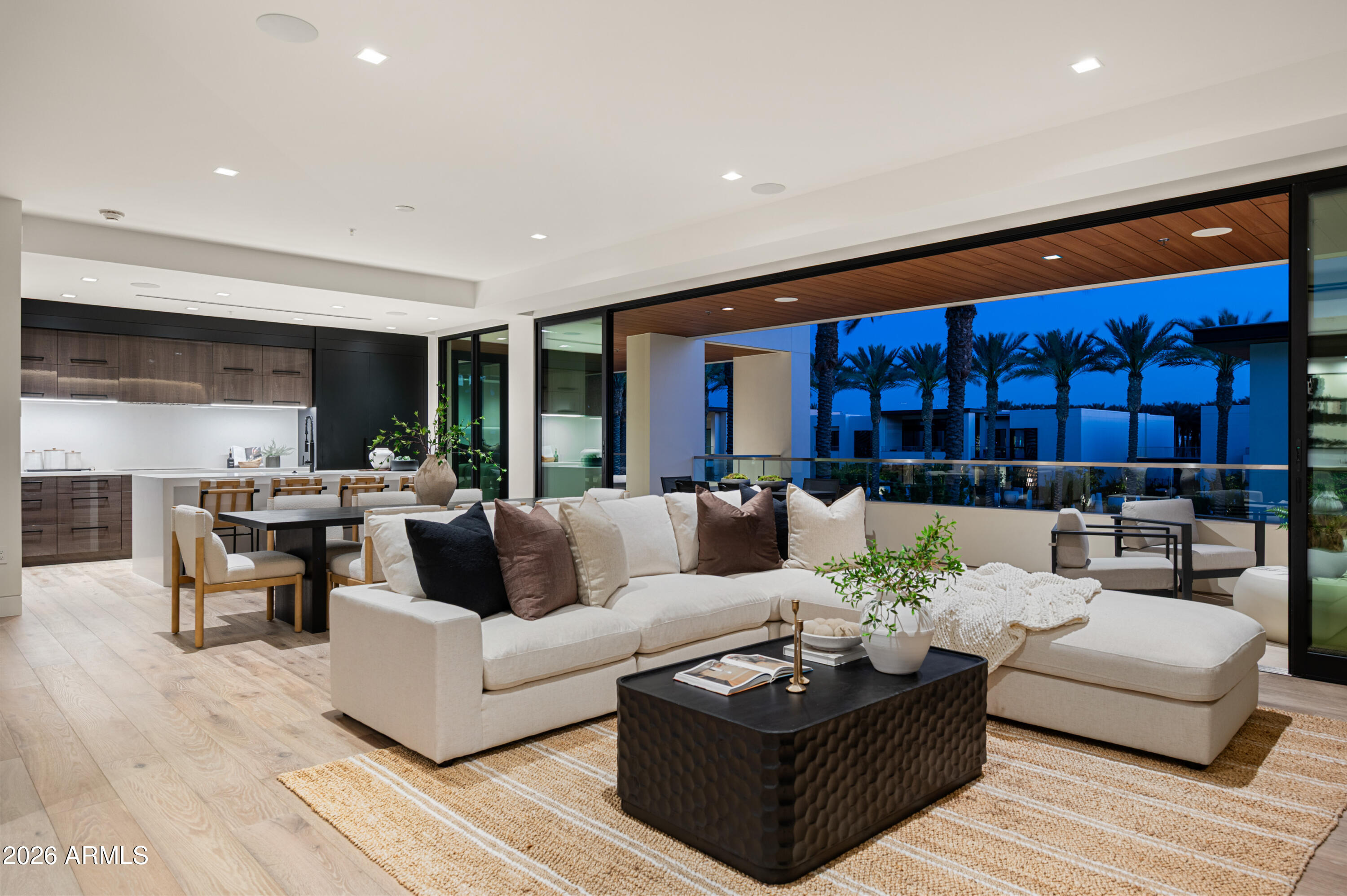 Experience elevated luxury living at The Ritz-Carlton Villa Residences in Paradise Valley. This exceptional 3-bedroom, 3.5-bath villa showcases custom developer upgrades and high-end finishes throughout, offering a refined yet comfortable lock and leave lifestyle.
Designed with a great room split floor plan, the home seamlessly blends indoor and outdoor living with a dramatic 27-foot sliding glass door that opens to one of only two fully covered patios, complete with a fireplace overlooking the pool and stunning Camelback Mountain views. Entertain with ease at the custom bar, thoughtfully equipped with a SubZero wine fridge, ice maker, dishwasher, microwave, and warming drawer. Additional features include a Crestron home automation system for effortless control and convenience. Private, secure access via elevator from the parking garage, with two dedicated parking spaces nearest the entrance for convenient access. Villa owners enjoy exclusive access to world-class Ritz-Carlton amenities including dedicated concierge service, resort-style pool and spa, fitness center and clubhouse.