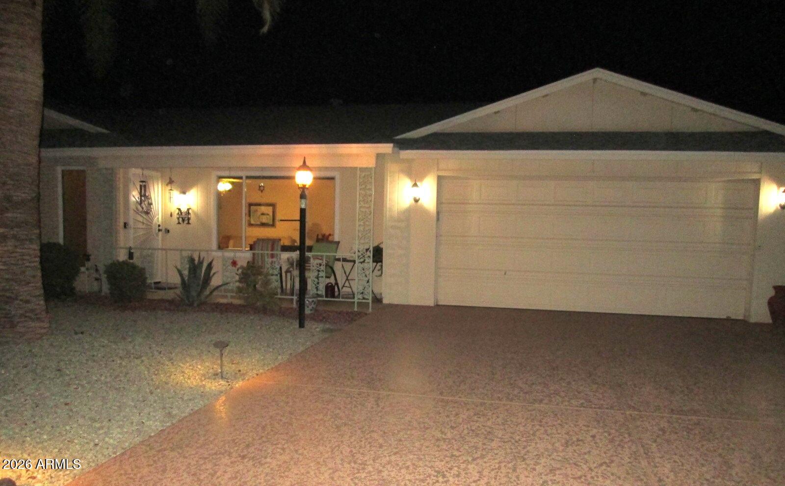 This well maintained, expanded, and recently upgraded Annapolis model home in the premier golf & pickleball retirement community of Sun City West is PRICED TO SELL at only $170.45 per s.f.  2 BR/2 bath home is conveniently located near Rec Centers, golf, and shopping. The extra room off the kitchen is ventilated. The 13' X 26' laundry room with window, door, & built in cabinets & desk c/b an office and also provides access the designed low-maintenance back yard. The updated eat-in kitchen features granite countertops, stylish backsplash, skylight, recessed lights, new sink, ample cabinets, a cozy dinette area, and a pantry. The spacious primary en-suite and guest room include walk-in closets with built-in storage and bathrooms remodeled in 2021. Newer flooring throughout, popcorn ceiling flooring throughout, new windows and shades (2025), roof (2020), and (HVAC 2017) and neutral color palette enhance the home's appeal and create an inviting atmosphere. Extended 2-car garage has a window, built-in cabinets, 2 openers, and outside key pad. Whether enjoying your front porch visiting neighbors or a BBQ in your back yard, this home combines comfort, charm, functionality, and the easy lifestyle our community is known for.  See list of upgrades for added peace of mind included in the documents section of this listing.