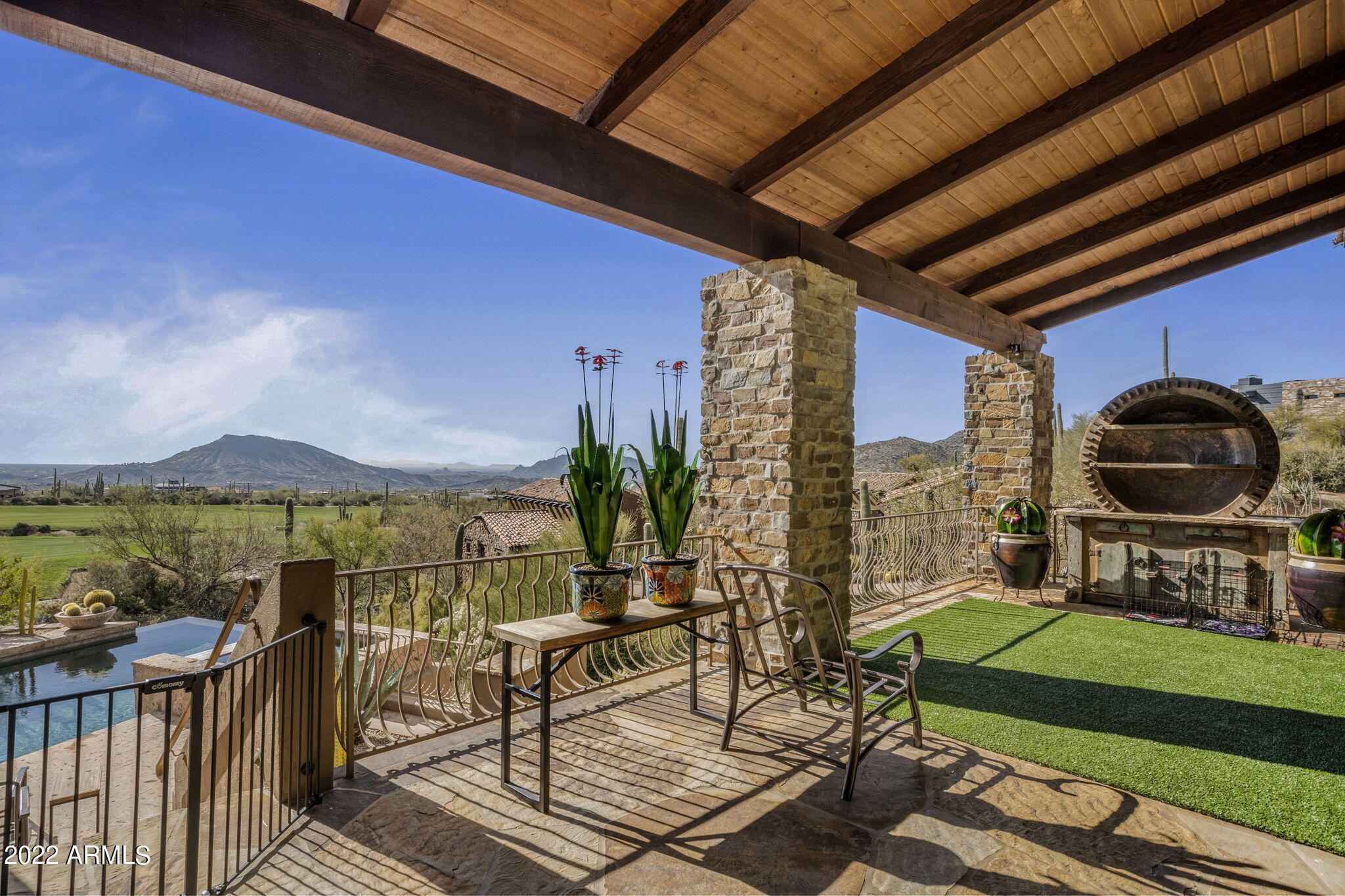 GOLF MEMBERSHIP AVAILABLE for TRANSFER!! Huge $300,000 PRICE REDUCTION!! Fabulous Bing Hu European Estate home in Desert Mountain's Saguaro Forest village. Located on the 17th hole of Chiricahua. Sweeping ridgetop golf, mountain and Valley views from the entire home with resort patio. Single level main home, with lower level billiard room, bar and home theater. Spacious, open great room and expansive covered patios are perfect for entertaining. Gourmet chef's kitchen with amazing custom cabinets, handsomely appointed library and simply elegant master suite. Finely finished with custom details and quality designer finishes throughout. Strategically located for proximity to both urban amenities and Arizona's vast outdoor recreational areas