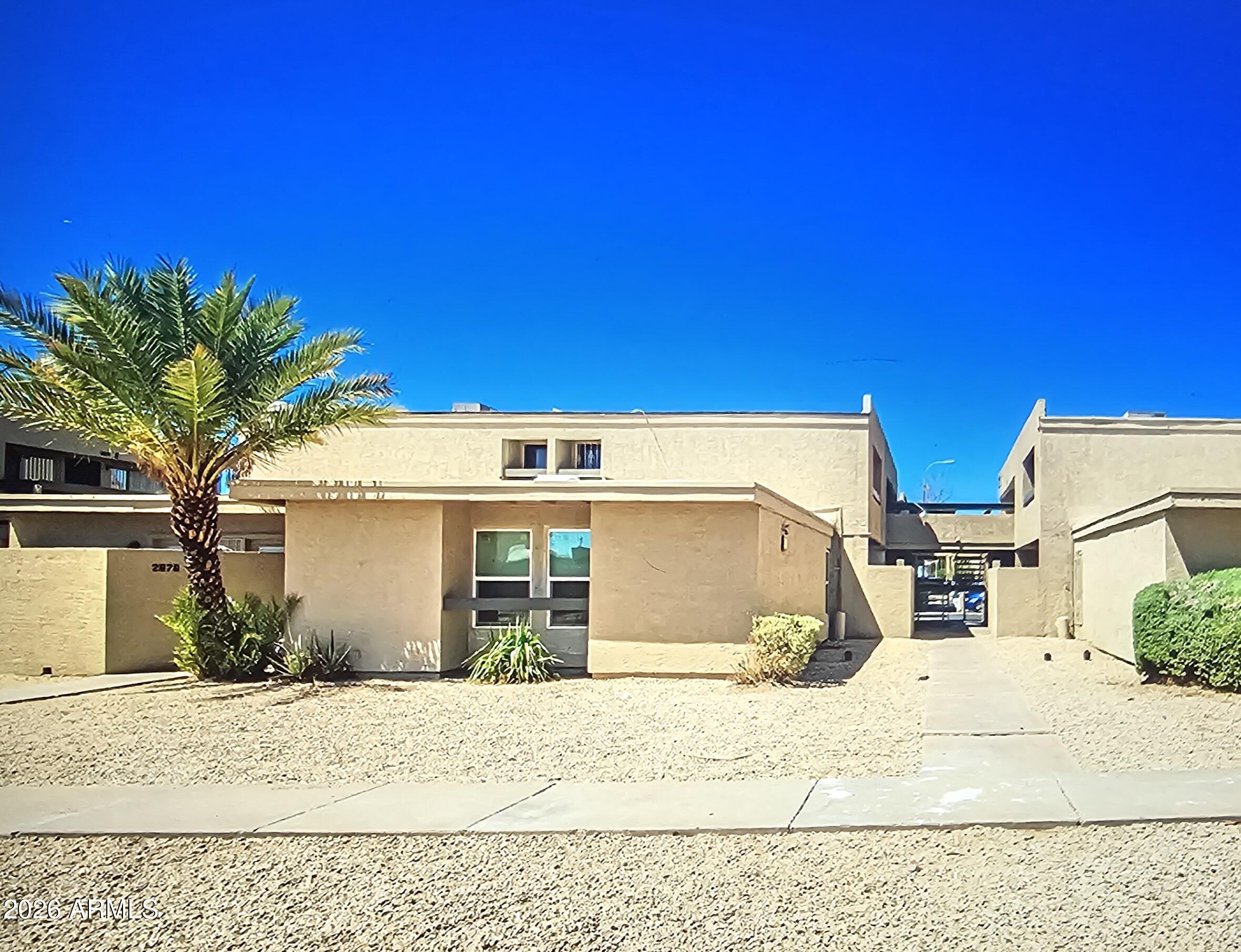 SINGLE LEVEL. NO STEPS. Perfect floor plan for a 3 bedroom 2 full bath with tile throughout the unit. Fully Renovated.  Private locked laundry room on the side. Unit has locked laundry room on the southeast corner of the building right next to the assigned carport space. Owner/Agent