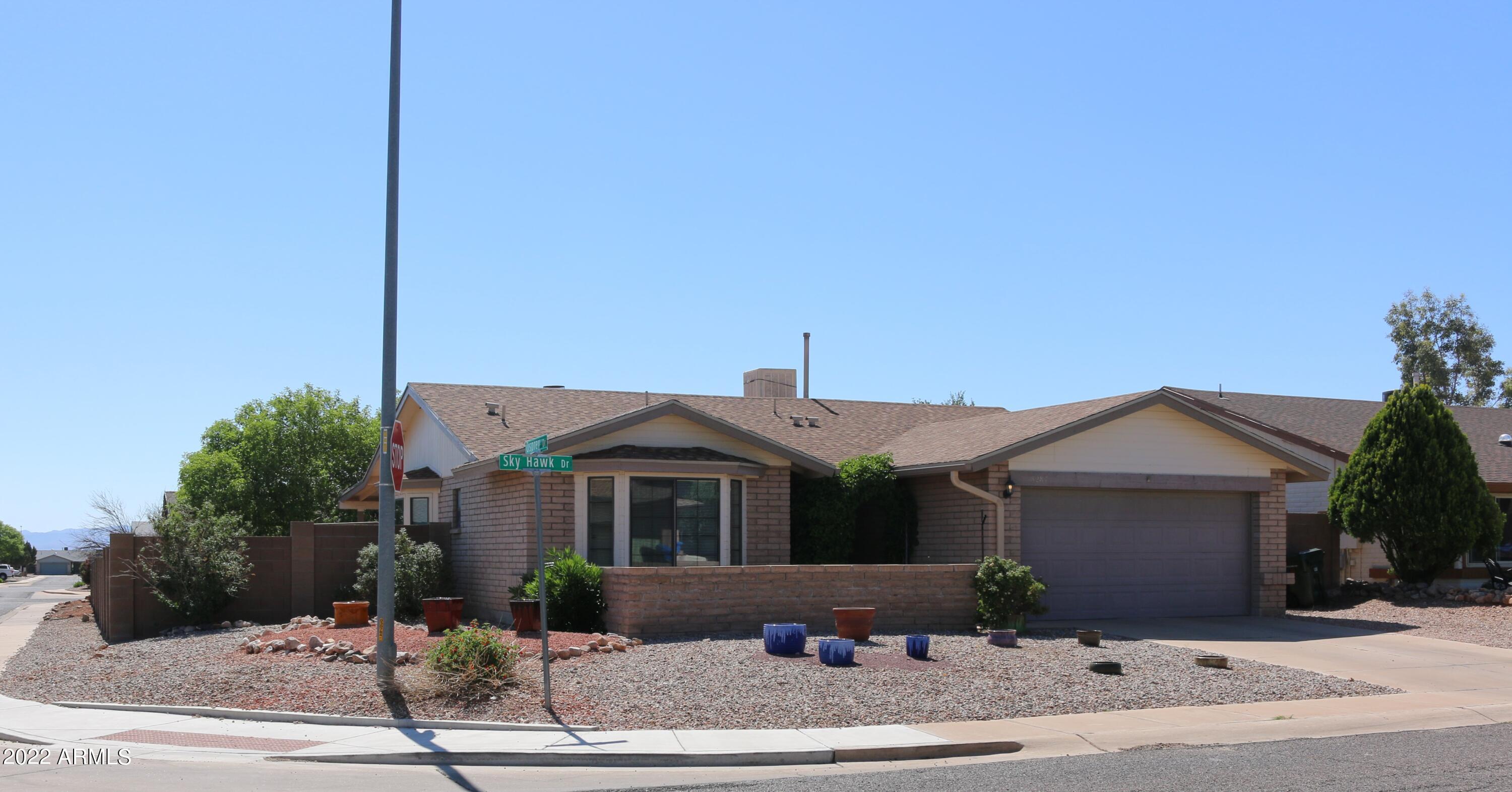 Very nice home! Living room has a wood burning fireplace, there is a separate dining area, and the split floor plan provides added privacy and quiet. The master suite has dual sinks and a large garden tub. Large backyard with mature trees and a covered patio you will enjoy all year round.