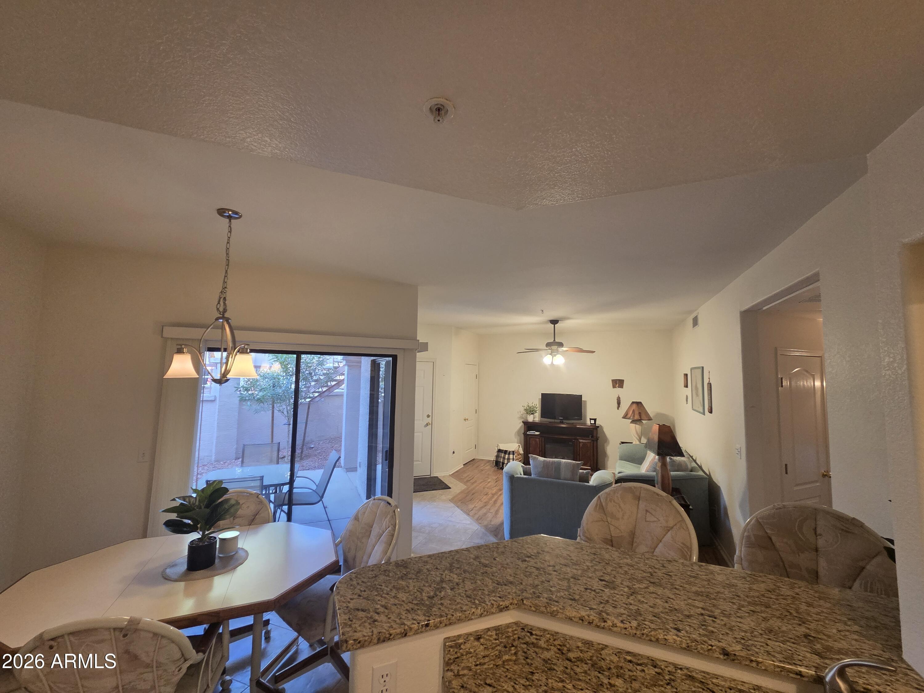 Price Reduced - Desirable 1st floor/2br/2ba, 978 sq ft, condo in a welcoming 55+ community.  Enjoy comfortable & convenient living in the beautifully remodeled unit with upgraded kitchen cabinets, granite countertop, modern appliances, newer flooring, light fixtures & upgraded ceiling fans.
The unit comes furnished for an easy move-in.  The community offers plenty of amenities including; a recreation center, heated pool & spa, kitchen facilities, shuffle board, bike racks, BBQ grills & temp RV parking.
Near bike/walking trail/golf courses/shopping/restaurants/Loop 101/Sun City & more.  This is the ideal spot for relaxation & active living.
1 covered parking space assigned .  HOA includes water/sewer/garbage/pest control/roof repair replacement.  Units can be rented, see CC&R's for detai