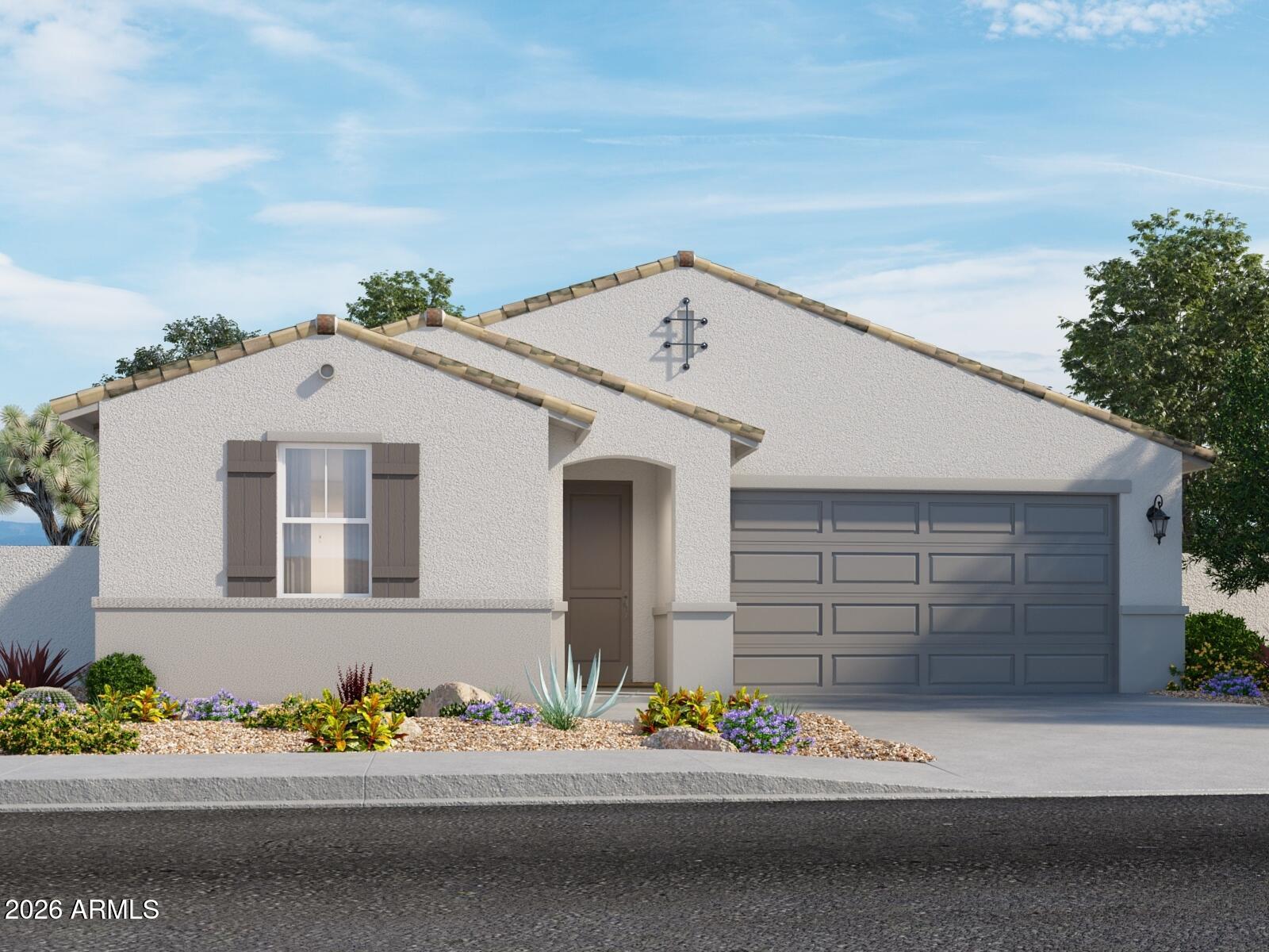 Charming Sawyer floor plan in the desirable Entrada community in Tolleson. This single-story home features a split floor plan with a comfortable primary suite set apart from the secondary bedrooms. The secondary generously sized bedrooms and a functional layout make this home ideal for a variety of living needs. Upgrades include umber dark cabinetry with hardware, quartz countertops, and extensive tile flooring that complement the home's modern design. Meritage homes are move-in ready with washer, dryer, refrigerator, and window blinds included, plus closing in 60 days or less guaranteed. Future community amenities will include a clubhouse and pool, perfect for easy living and entertaining. Each of our homes is energy-efficient construction while providing comfort and long-term savings.